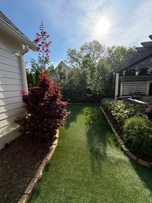 a view of a back yard of the house