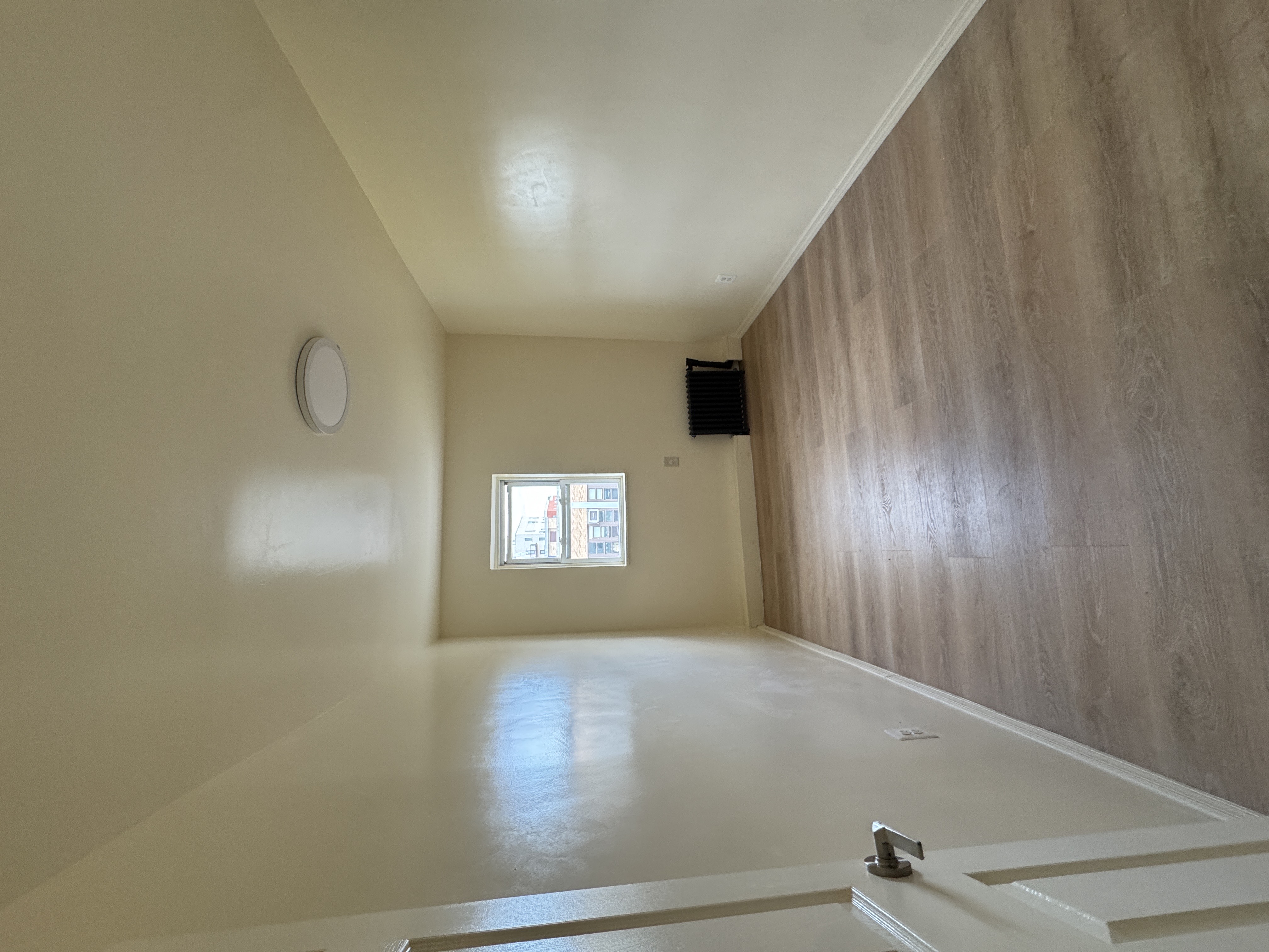 1333 Bristow Street Bronx, NY 10459 - Photo 2 of 6 a view of an empty room and window