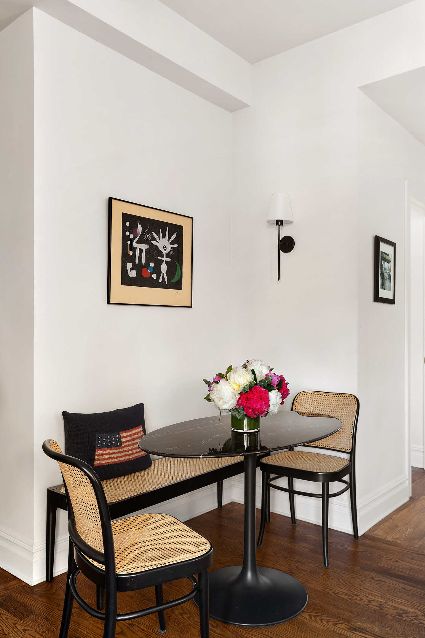 25 5th Avenue, Unit 8F Manhattan, NY 10003 - Photo 5 of 9 a view of a livingroom with furniture and wooden floor