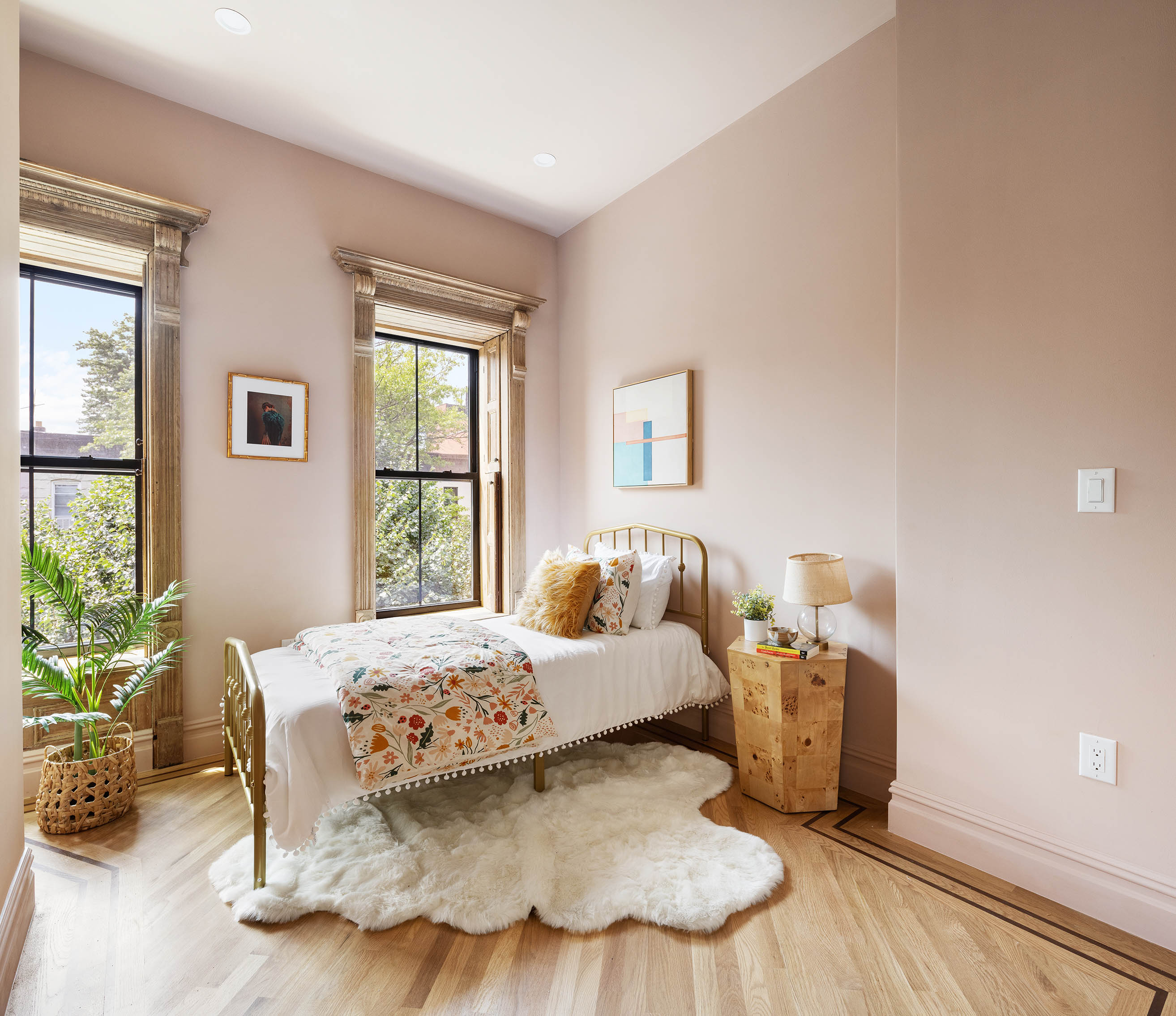 647 Macon Street Brooklyn, NY 11233 - Photo 14 of 20 a bedroom with a bed and a window