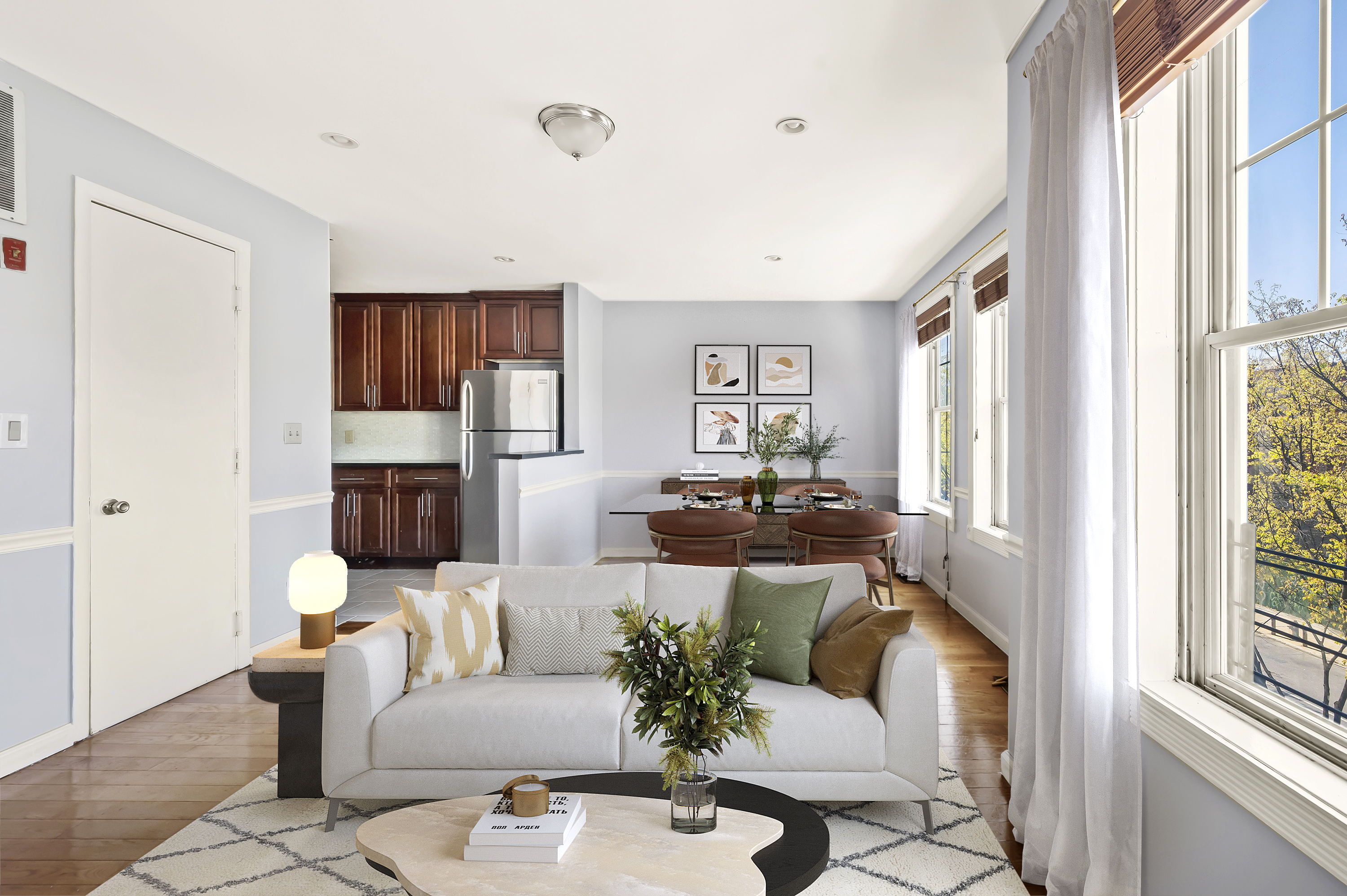 930 Jefferson Avenue, Unit 2 Brooklyn, NY 11221 - Photo 3 of 12 a living room with furniture and a fireplace
