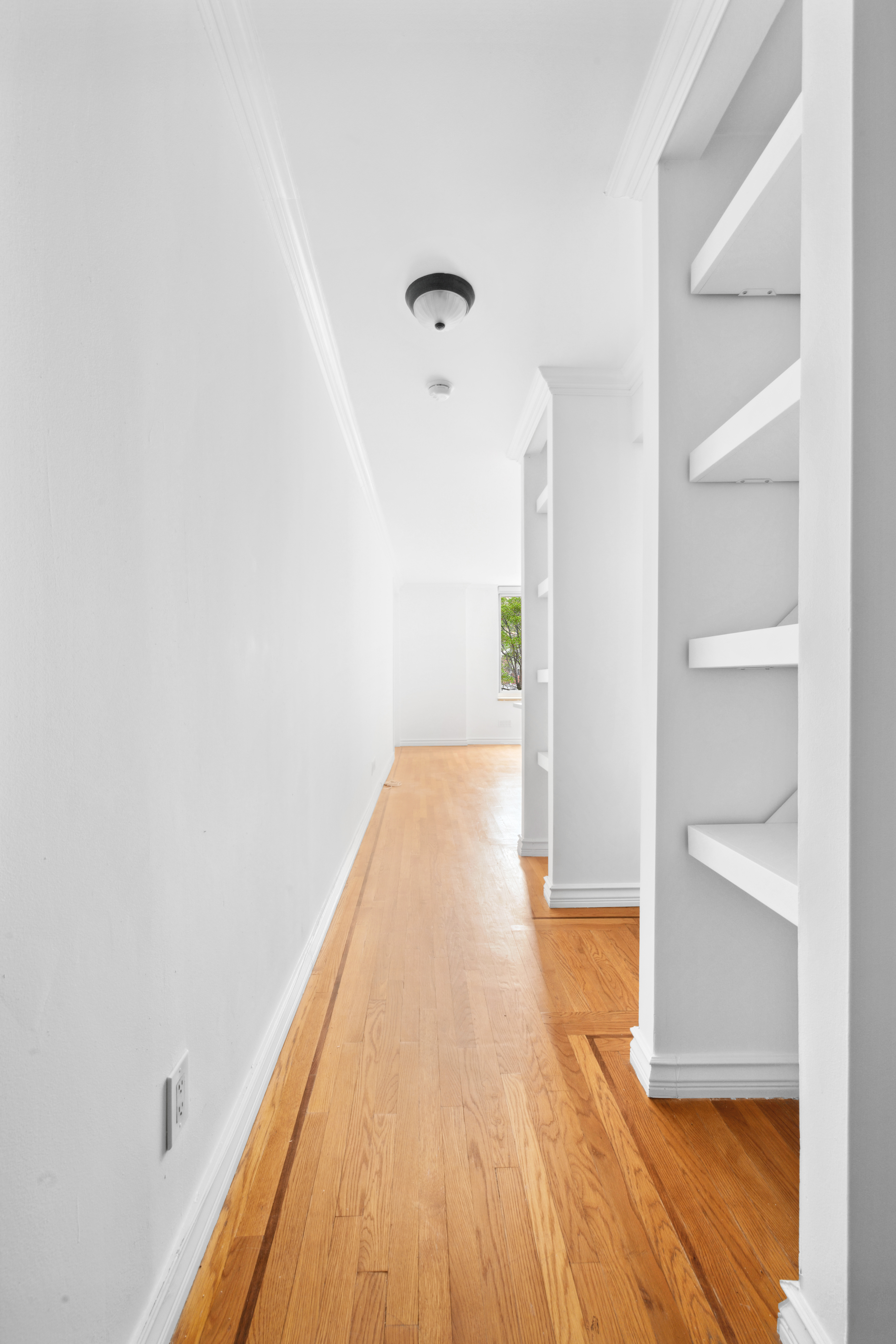 201 West 72nd Street, Unit 3I Manhattan, NY 10023 - Photo 9 of 13 a view of a room with wooden floor