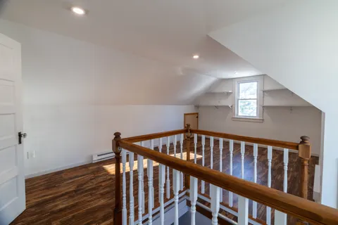 a view of a house with a snow in the yard