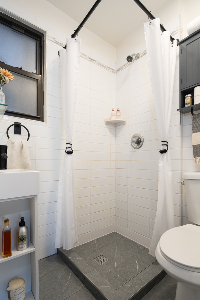 264 West 22nd Street Manhattan, NY 10011 - Photo 6 of 7 a bathroom with a toilet and a shower
