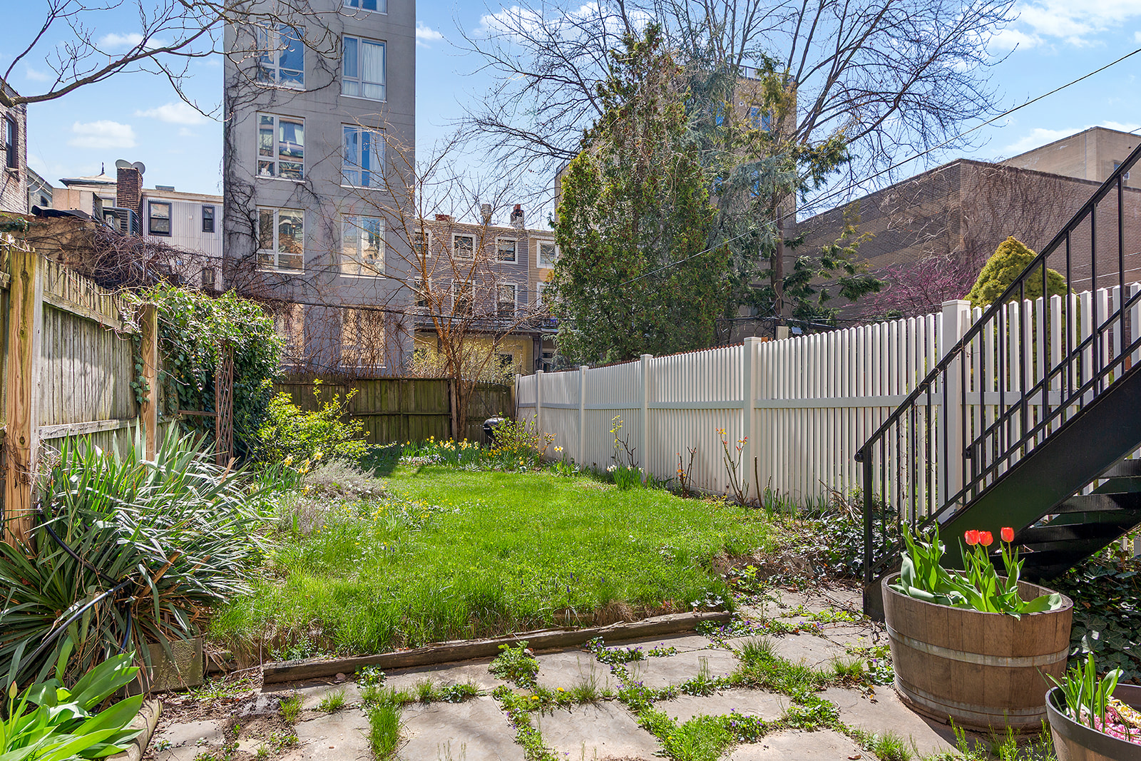 544 Pacific Street Brooklyn, NY 11217 - Photo 14 of 15 a view of a chair and table in the backyard