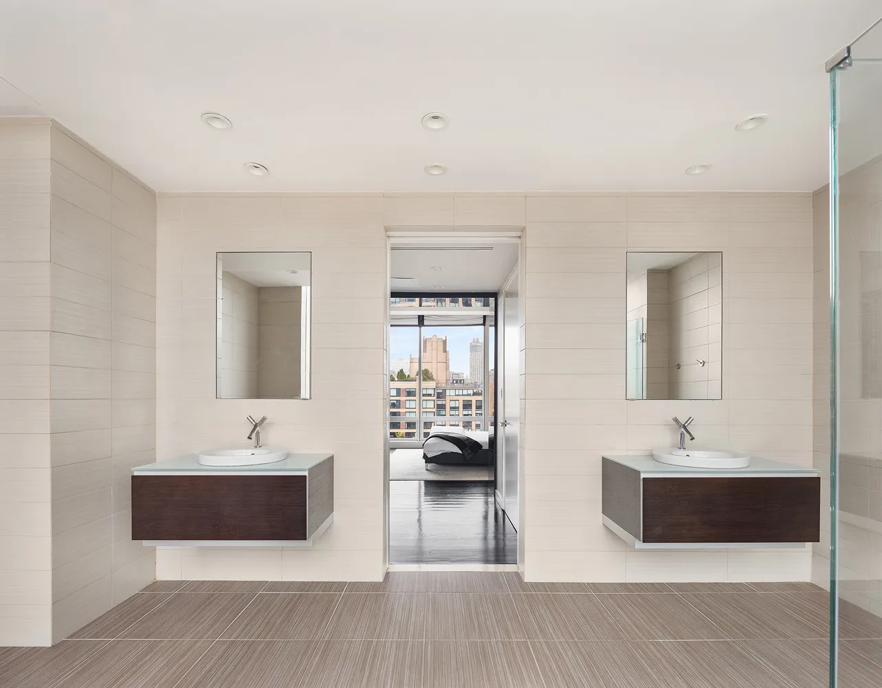 a bathroom with a double vanity sink a mirror and a