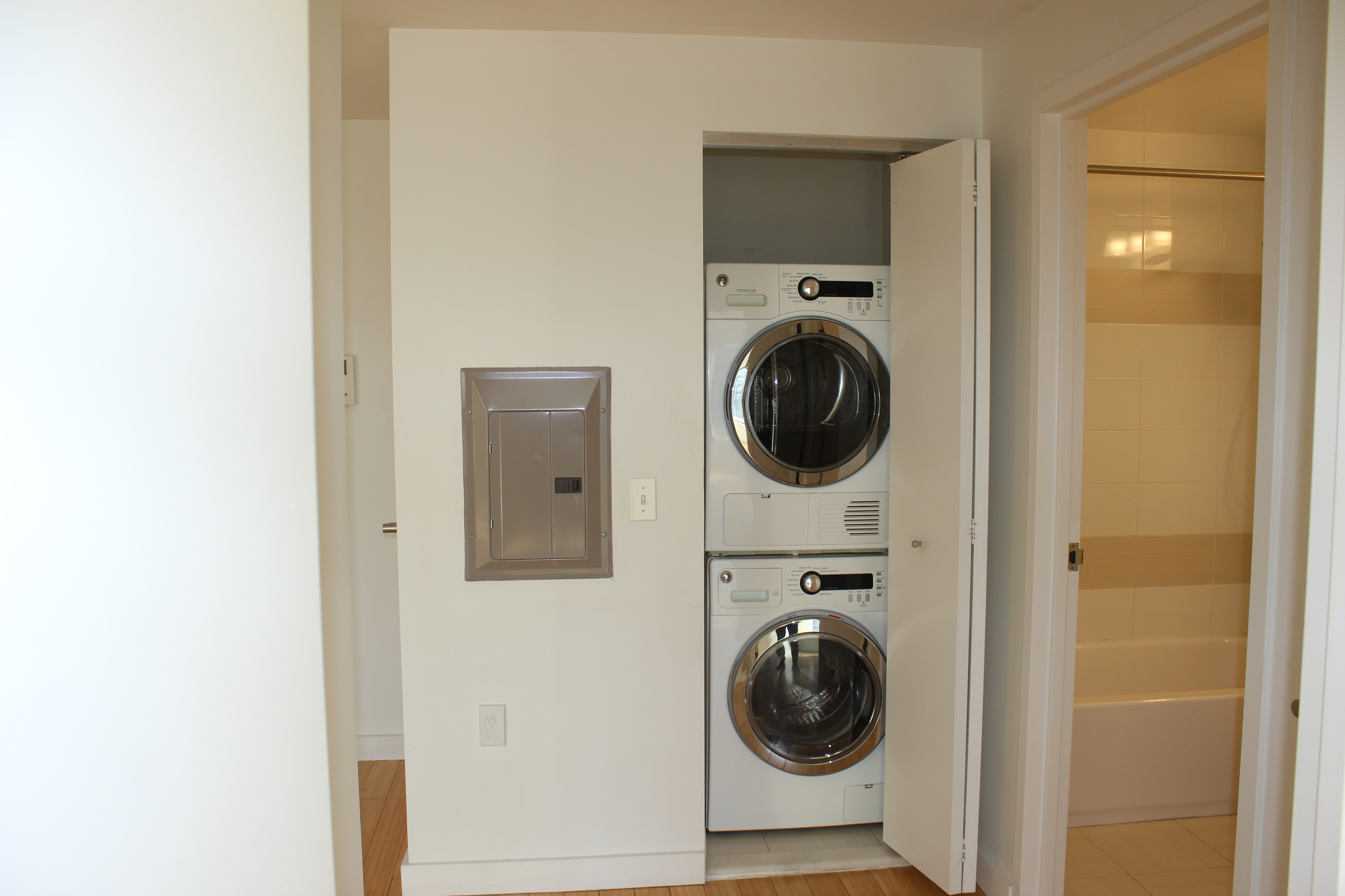 212 South Oxford Street, Unit 7K Brooklyn, NY 11217 - Photo 10 of 16 a utility room with dryer and washer