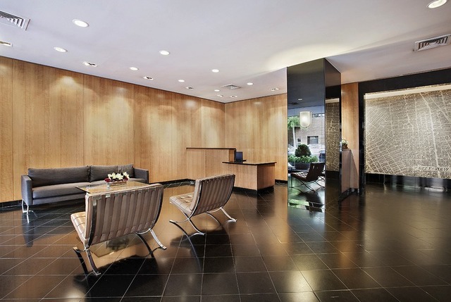 101 West 12th Street, Unit 15JK Manhattan, NY 10011 - Photo 21 of 22 a view of a dining room with furniture and wooden floor