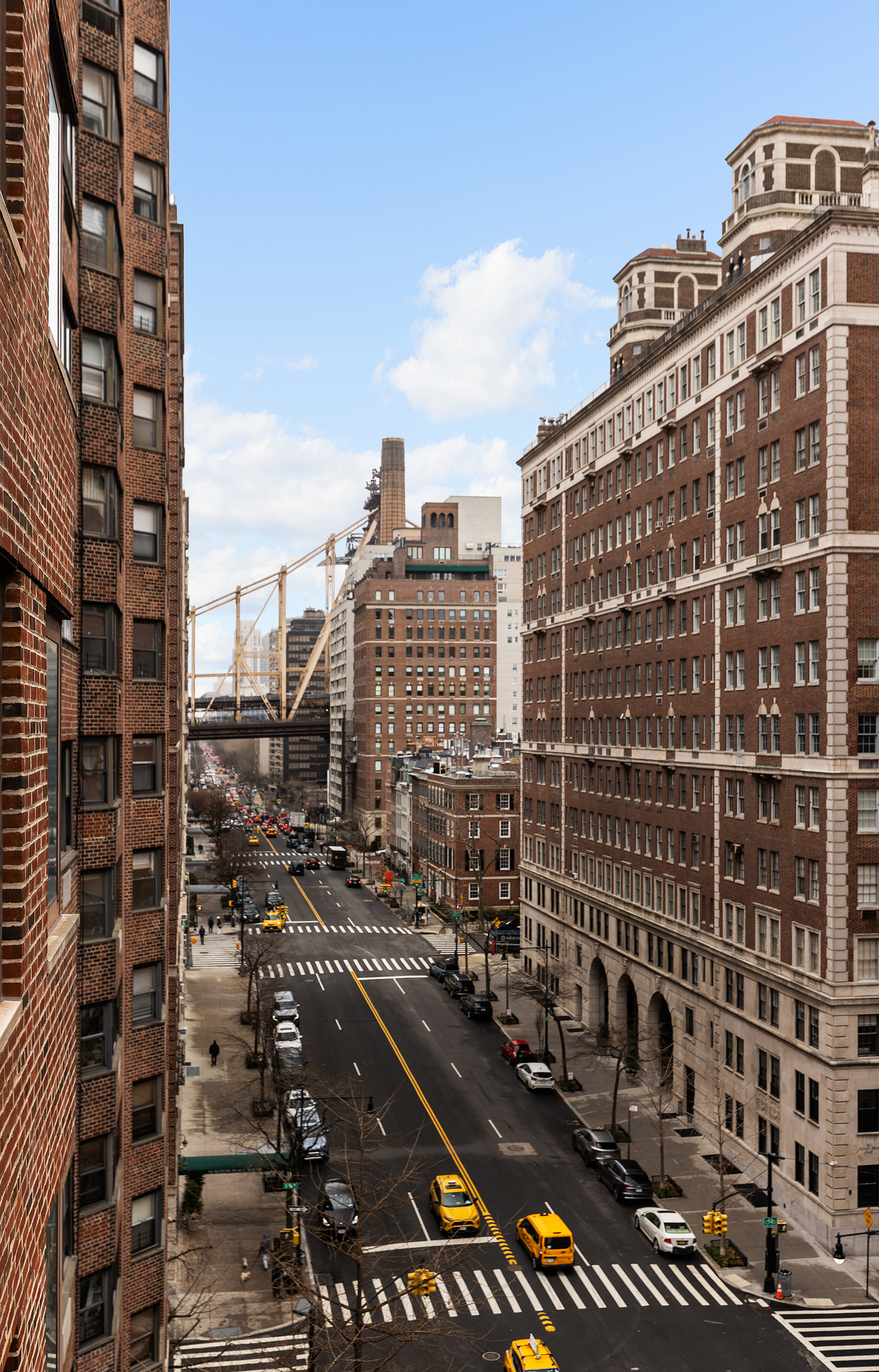36 Sutton Place South, Unit 10B Manhattan, NY 10022 - Photo 7 of 16 a city view with tall buildings