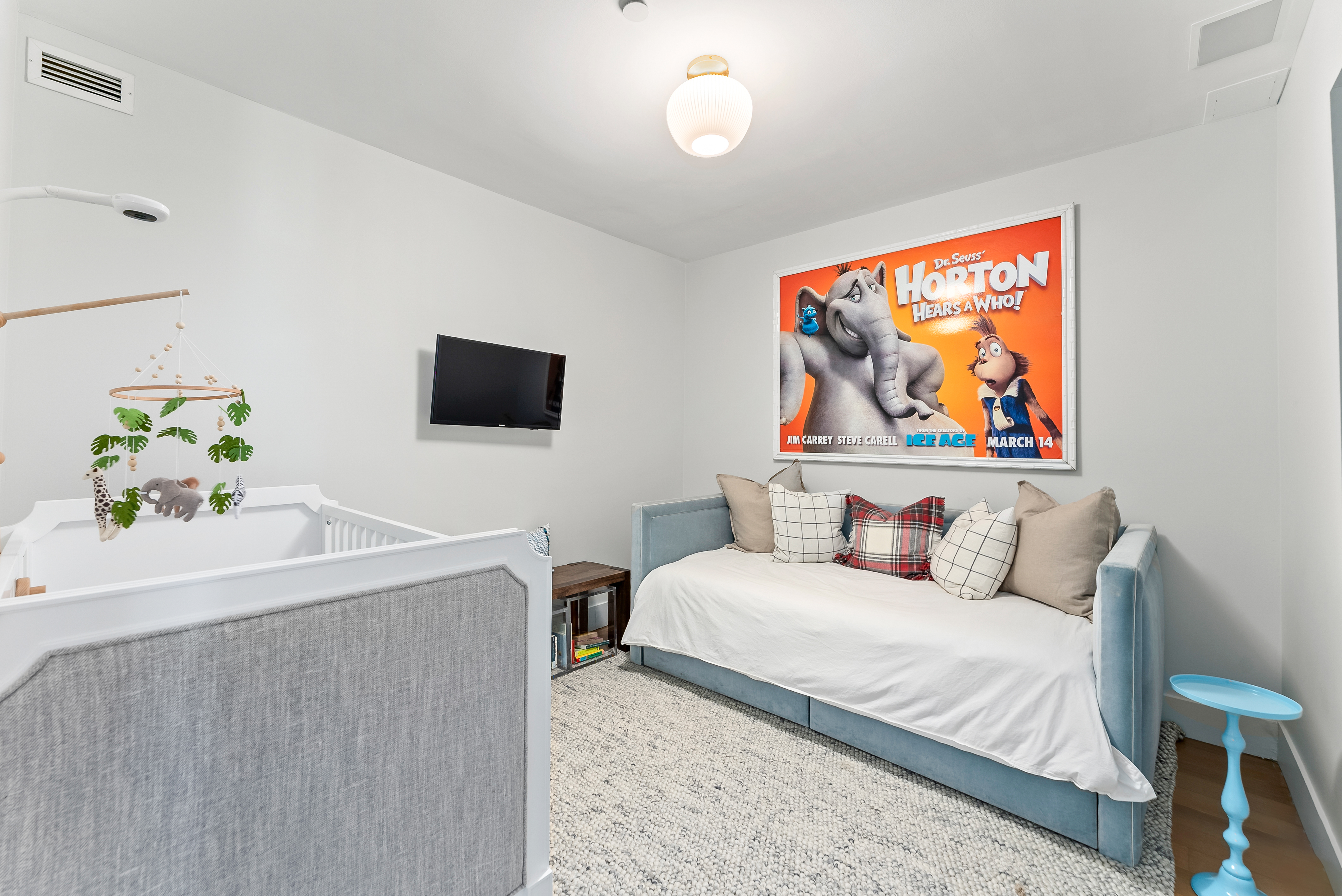 15 West 20th Street, Unit 9A Manhattan, NY 10011 - Photo 14 of 21 a bedroom with a bed and a flat screen tv