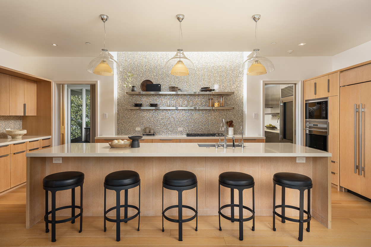 20 Crest Road Belvedere, CA 94920 - Photo 22 of 66 a kitchen with a sink and chairs
