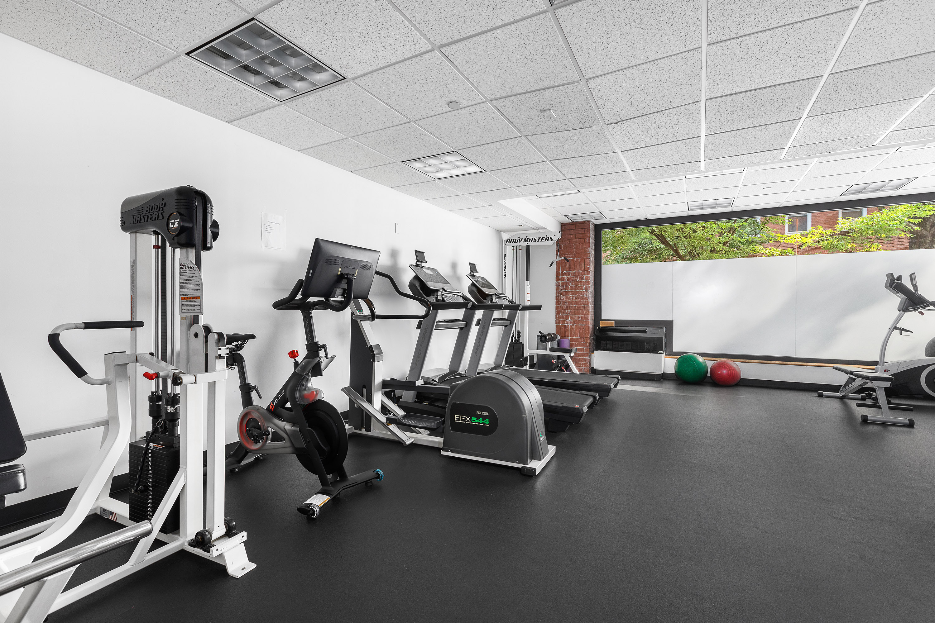 225 Pacific Street, Unit 3C Brooklyn, NY 11201 - Photo 9 of 10 a view of a room with gym equipment