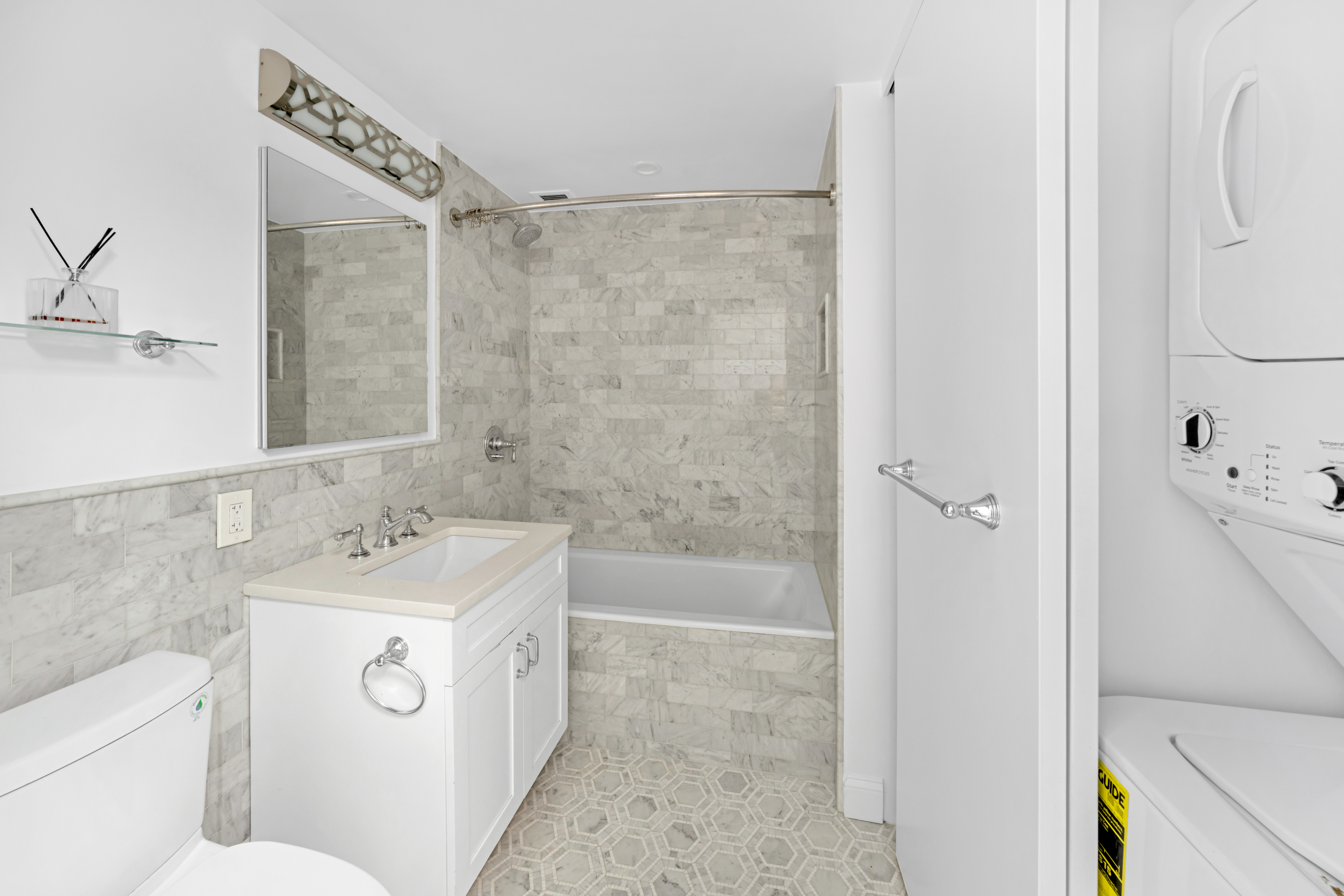 110 West 90th Street, Unit 5C Manhattan, NY 10024 - Photo 14 of 15 a bathroom with a sink a toilet and shower