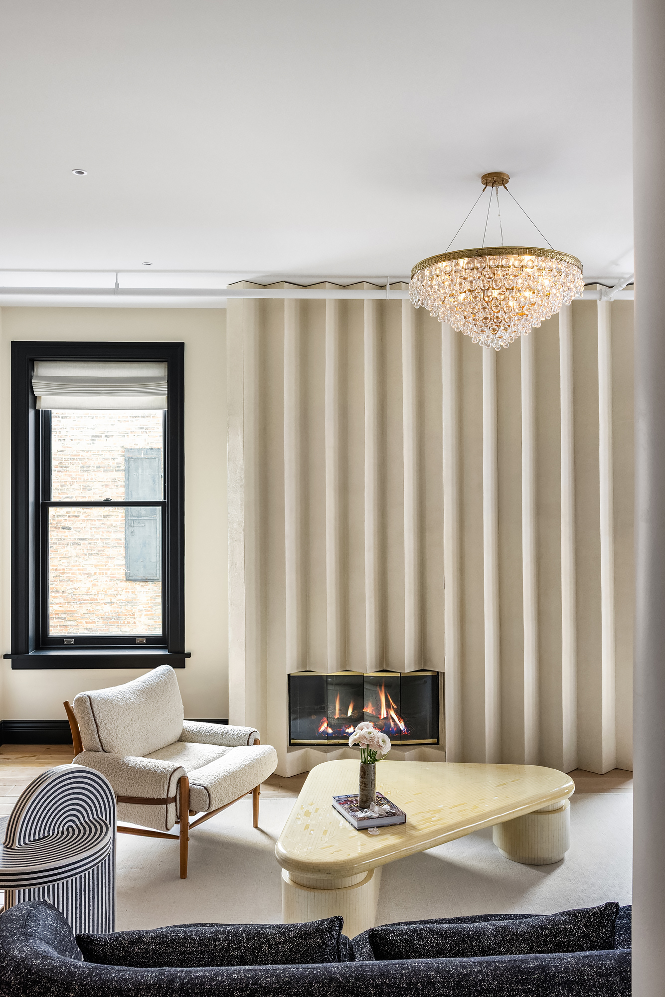 158 Mercer Street, Unit 6B Manhattan, NY 10012 - Photo 3 of 16 a living room with furniture and a window