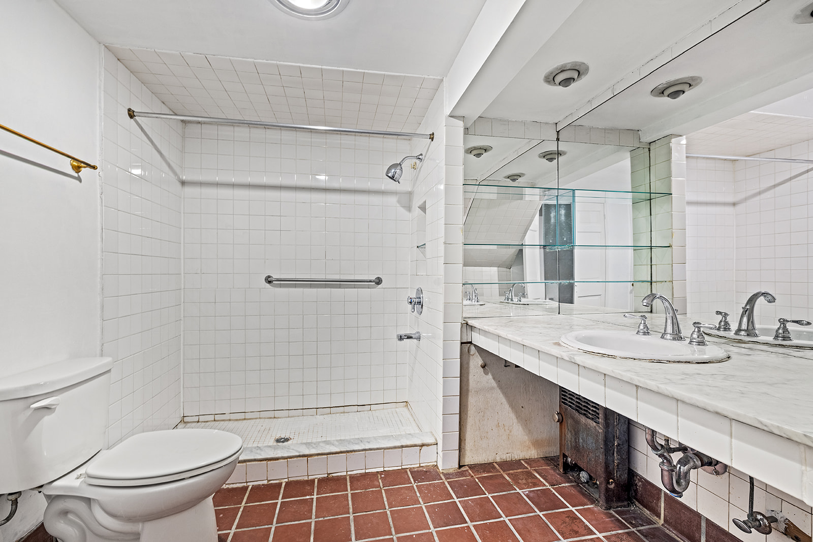44 Butler Street Brooklyn, NY 11231 - Photo 10 of 22 a bathroom with a double vanity sink toilet and shower