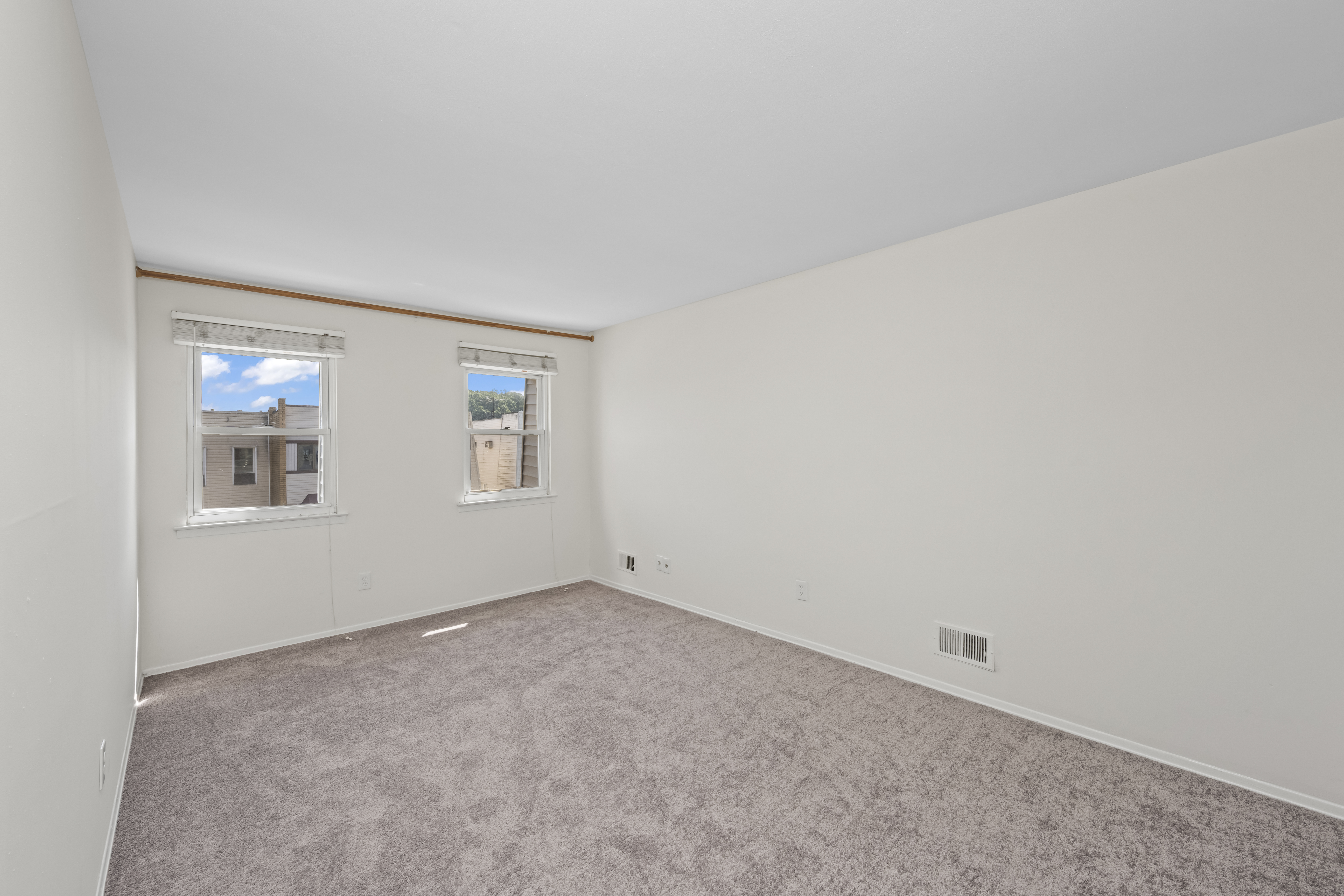 12 Yucca Drive Staten Island, NY 10312 - Photo 8 of 21 an empty room with windows