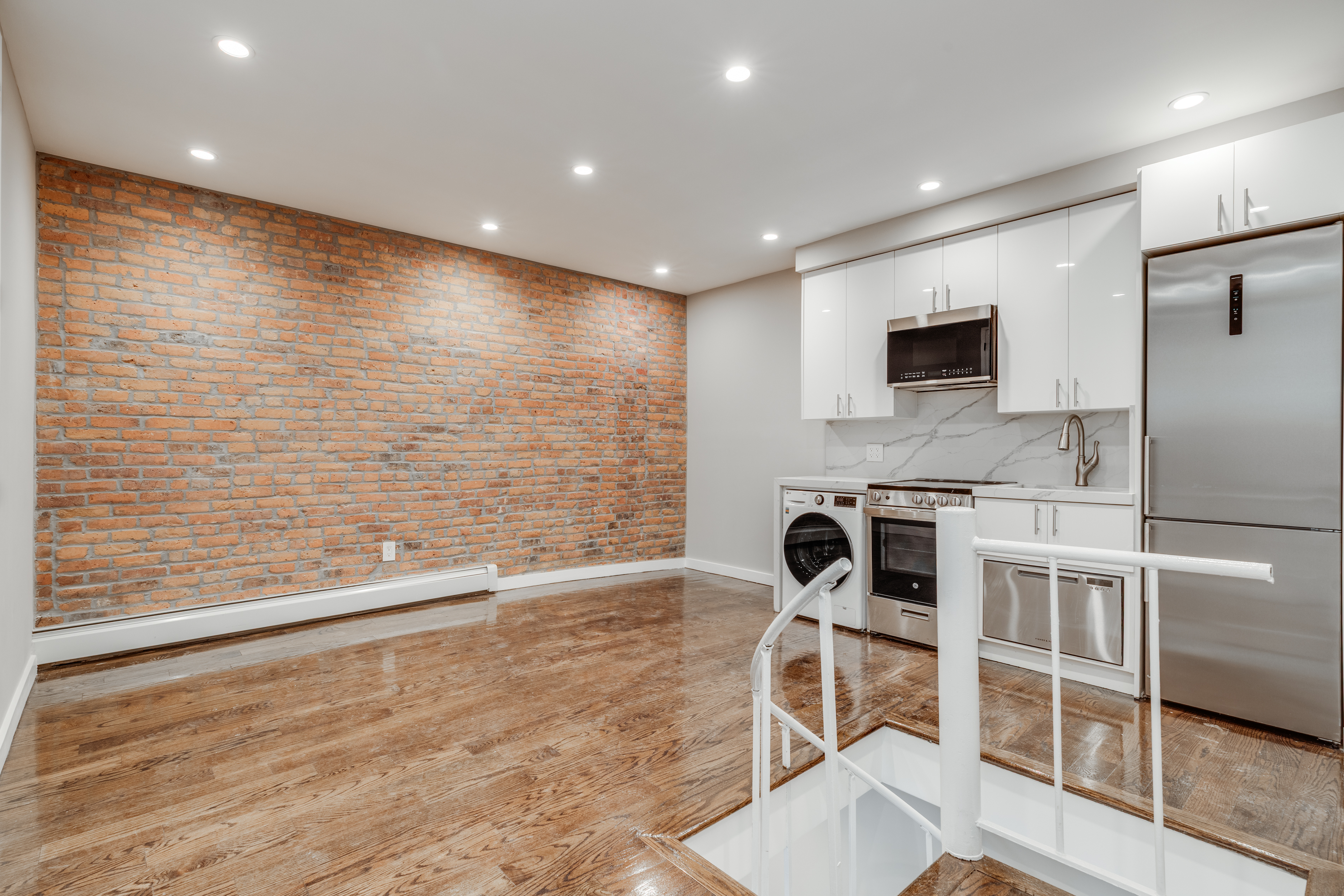 464 West 23rd Street, Unit 1R Manhattan, NY 10011 - Photo 3 of 9 a view of kitchen with sink