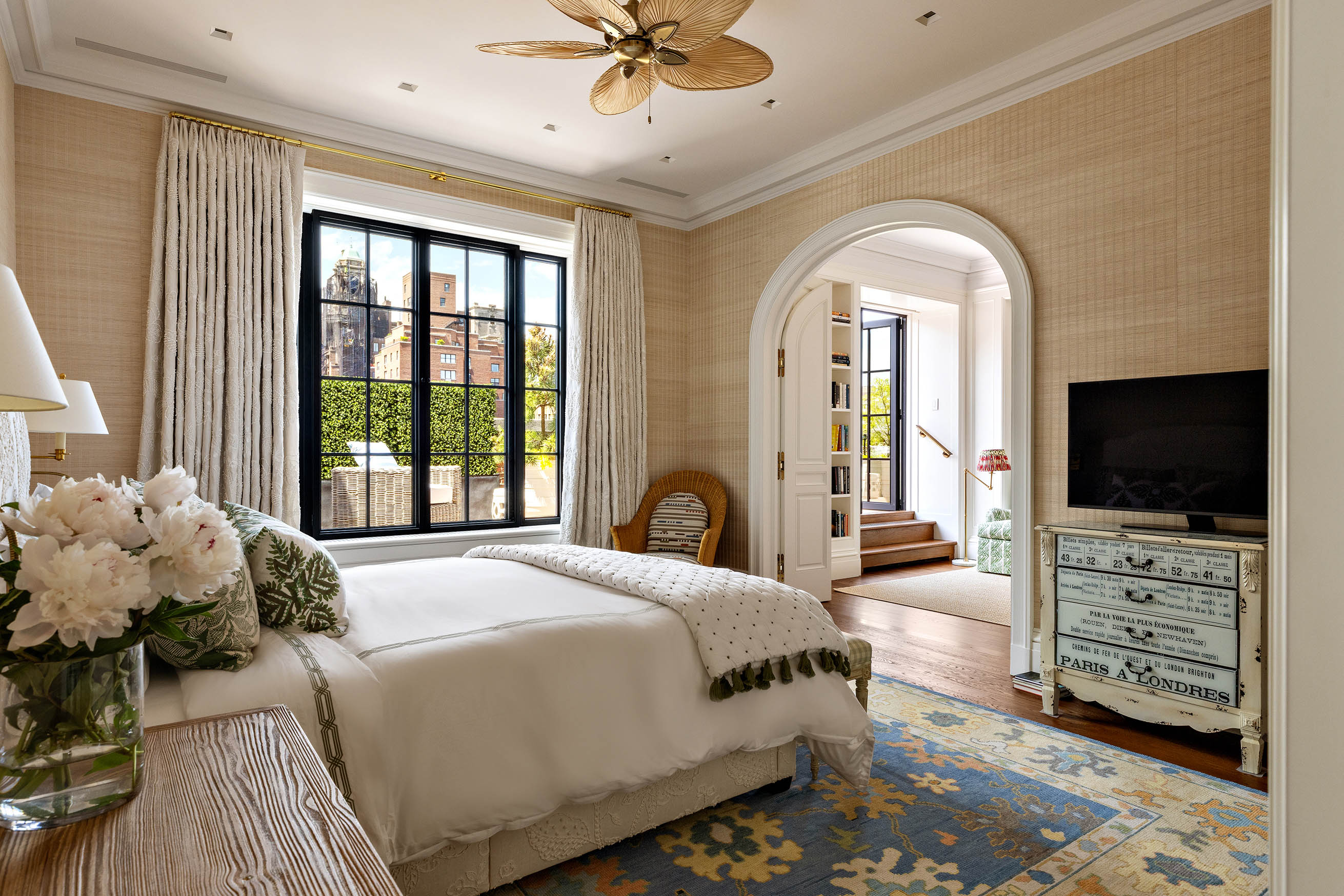 150 East 73rd Street, Unit PH Manhattan, NY 10021 - Photo 13 of 29 a spacious bedroom with a bed and a flat screen tv