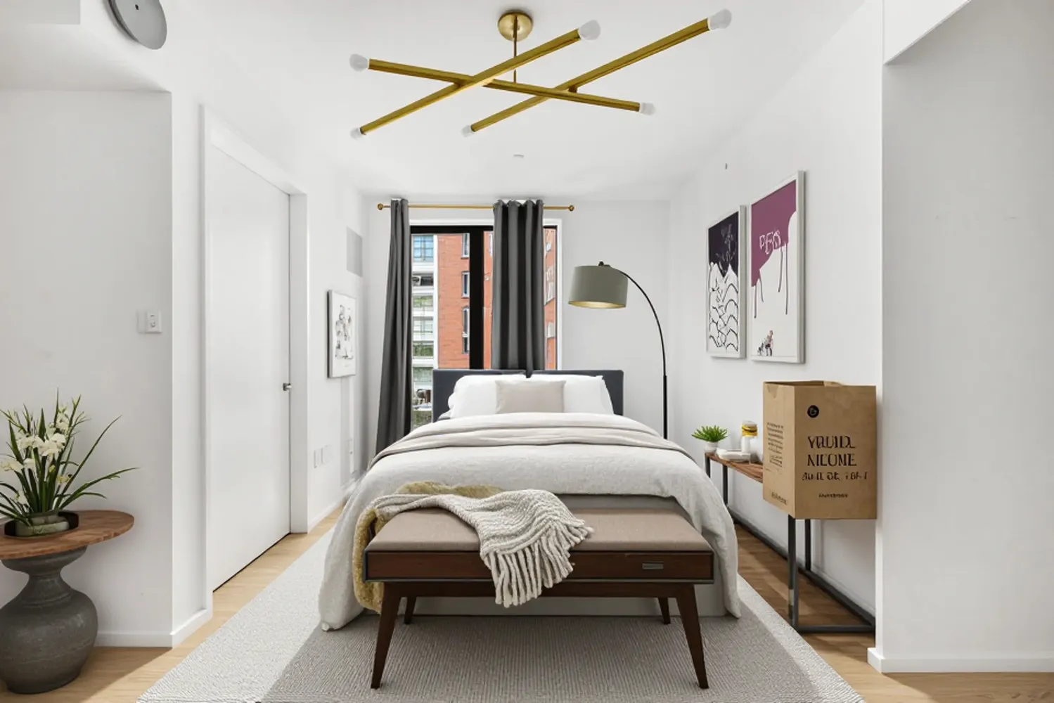 a bedroom with furniture and a potted plant