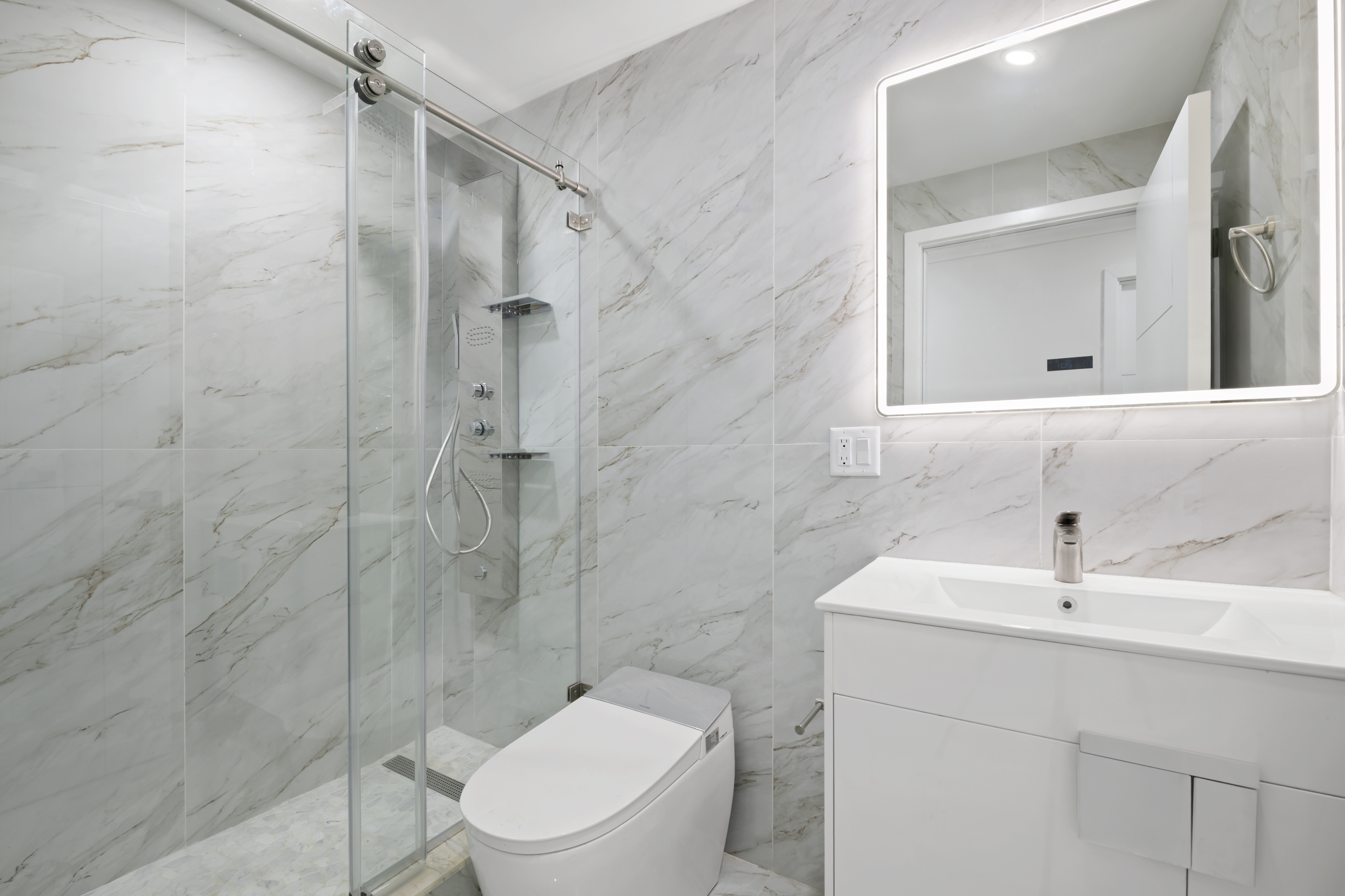 84 Himrod Street Brooklyn, NY 11221 - Photo 31 of 35 a bathroom with a sink toilet and shower