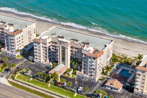 an aerial view of a building with outdoor space