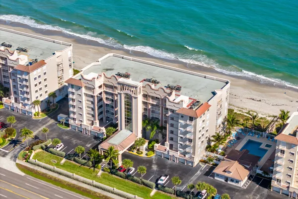 an aerial view of a building with outdoor space