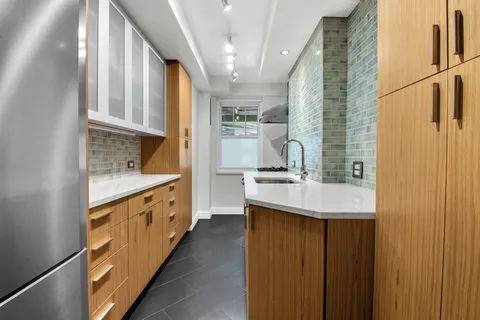 a bathroom with a sink a toilet and a bathtub