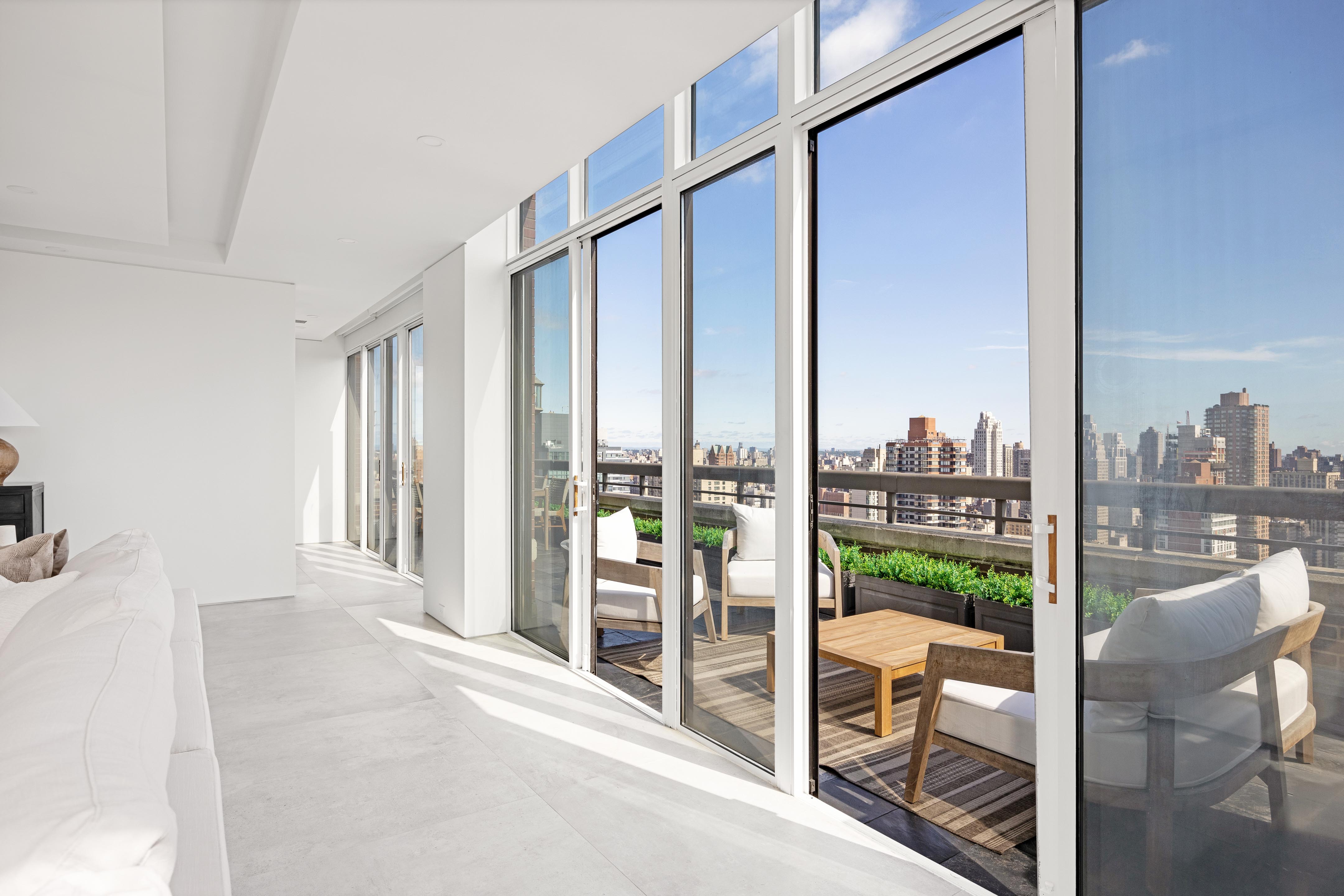 422 East 72nd Street, Unit 37AD Manhattan, NY 10021 - Photo 28 of 38 a view of a living room with furniture