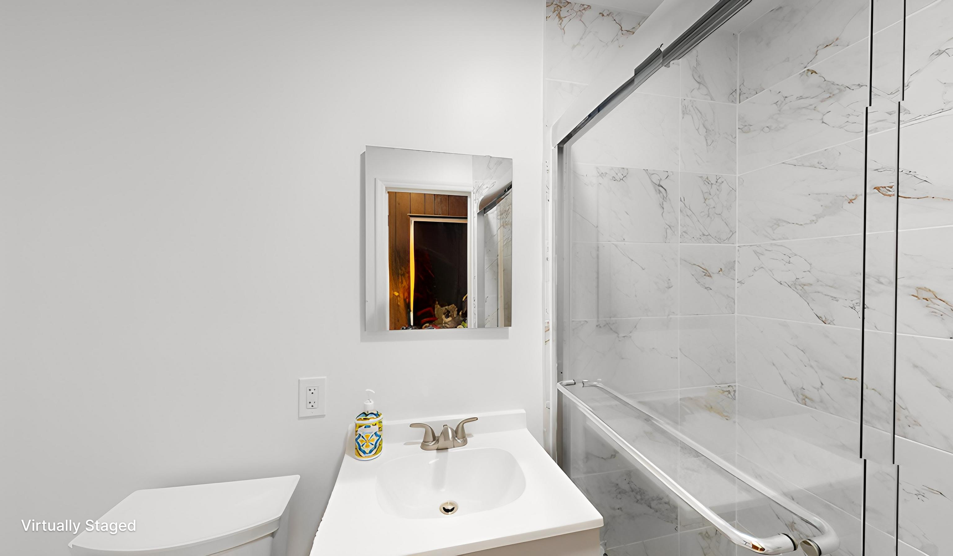 10 Seeley Street Brooklyn, NY 11218 - Photo 9 of 27 a bathroom with a toilet a sink and a bathtub