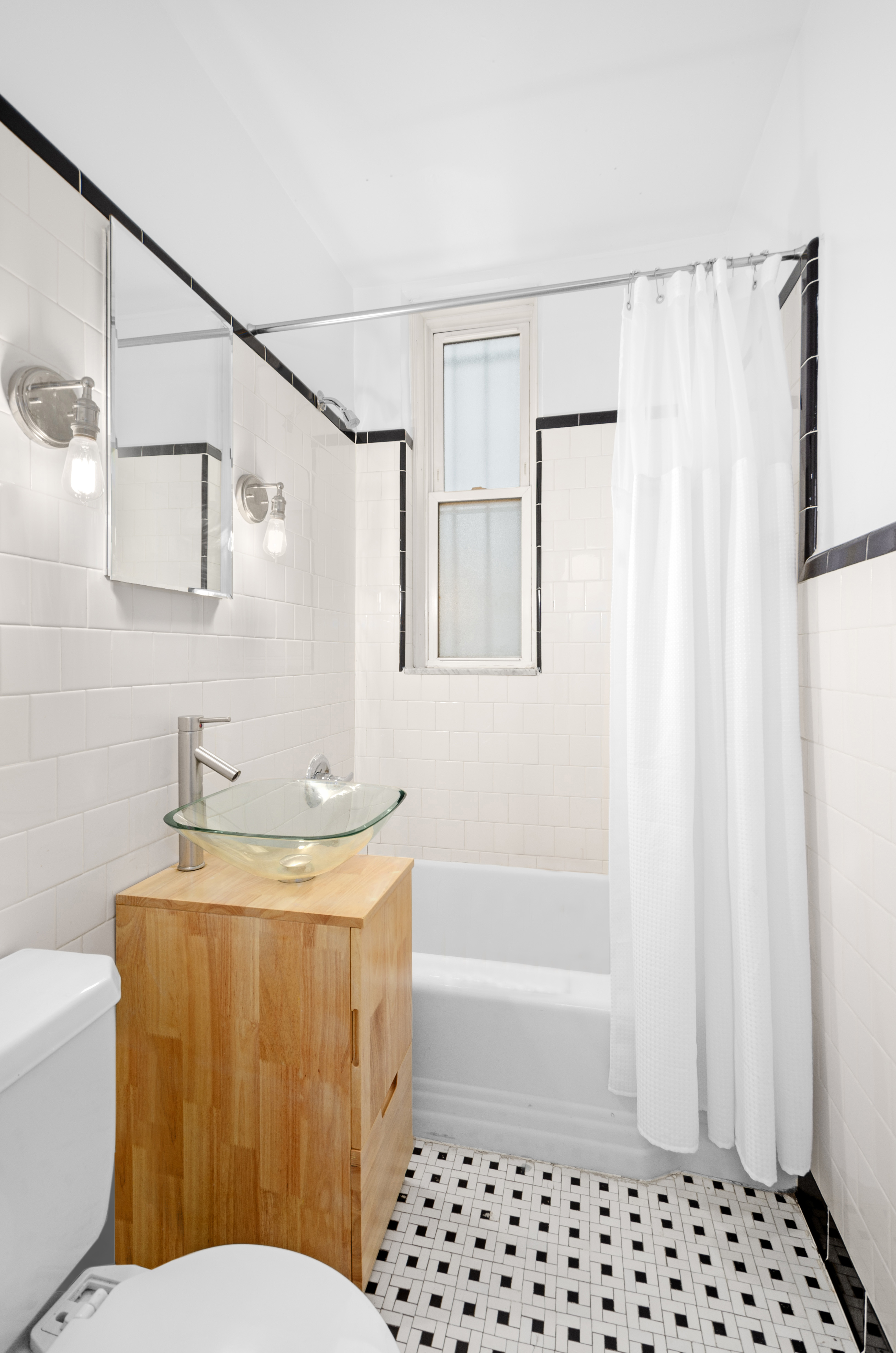 231 Park Place, Unit 12 Brooklyn, NY 11238 - Photo 5 of 18 a bathroom with a sink toilet and shower