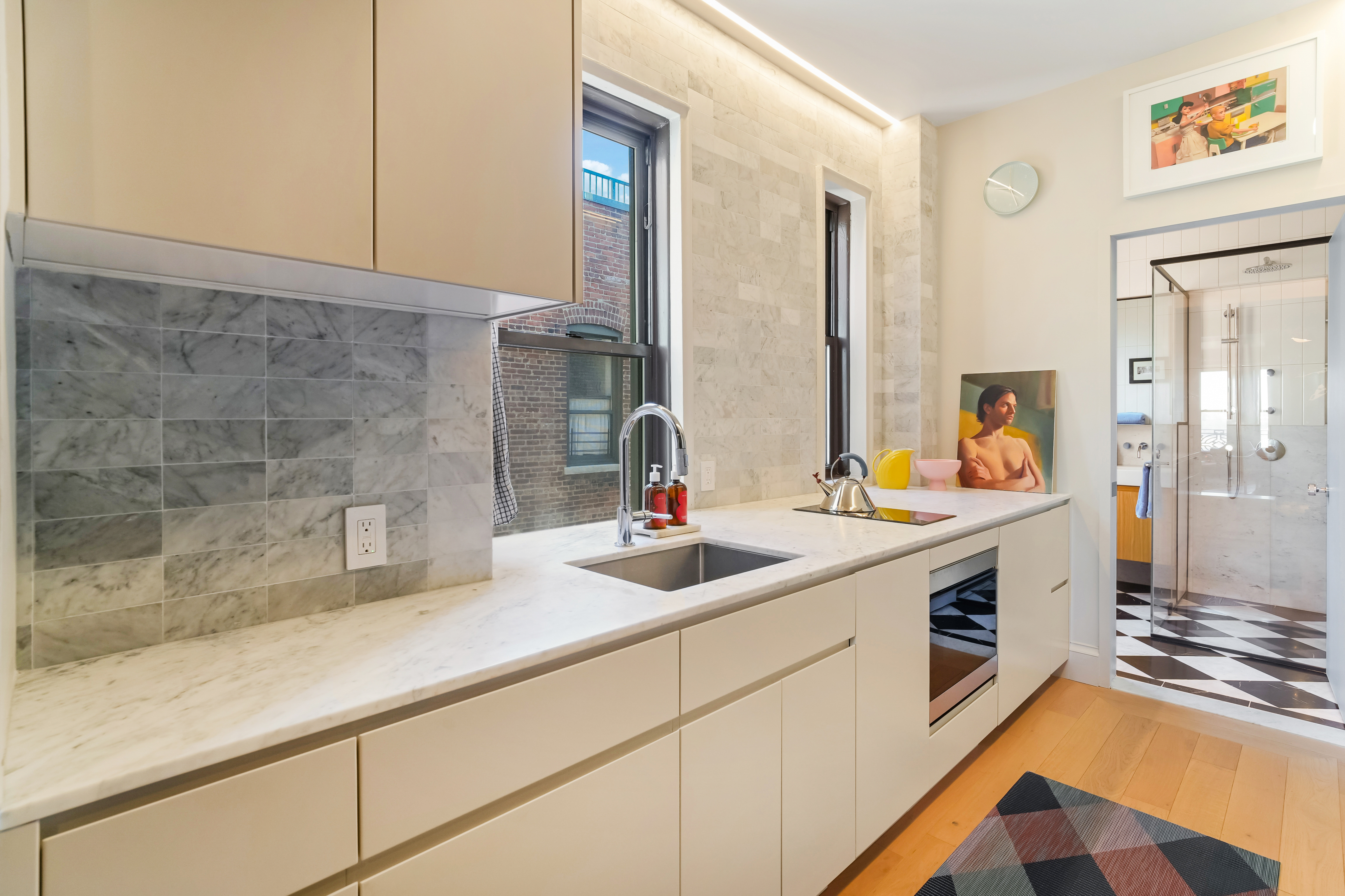 265 Riverside Drive, Unit 11F Manhattan, NY 10025 - Photo 10 of 18 a bathroom with a sink and a mirror