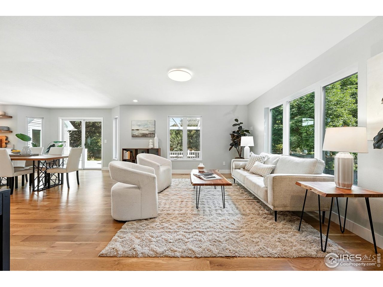 4557 Apple Way Boulder, CO 80301 - Photo 14 of 50 a living room with furniture and a large window