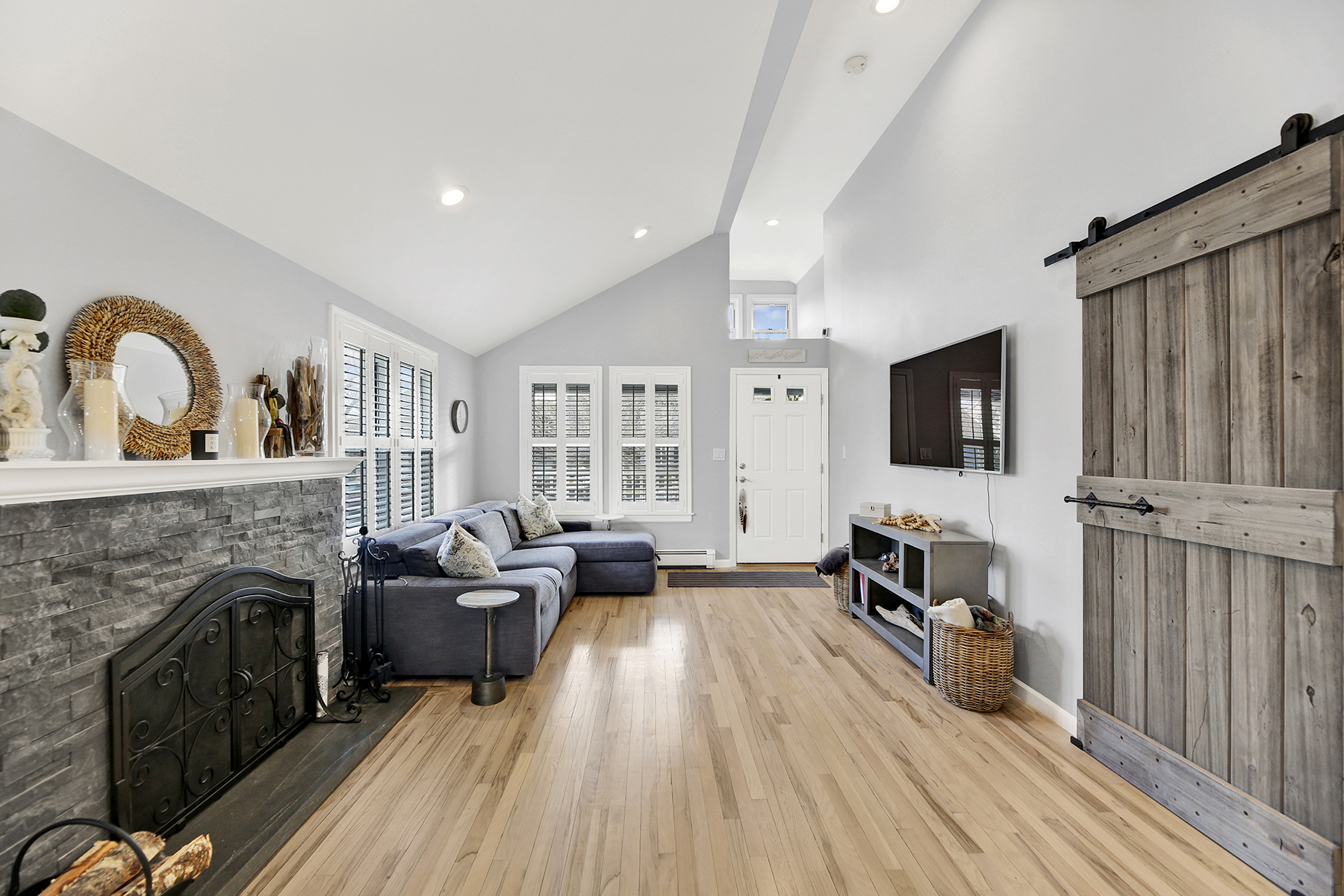 4-53 Beach 142nd Street Queens, NY 11694 - Photo 9 of 39 a living room with furniture fireplace and flat screen tv