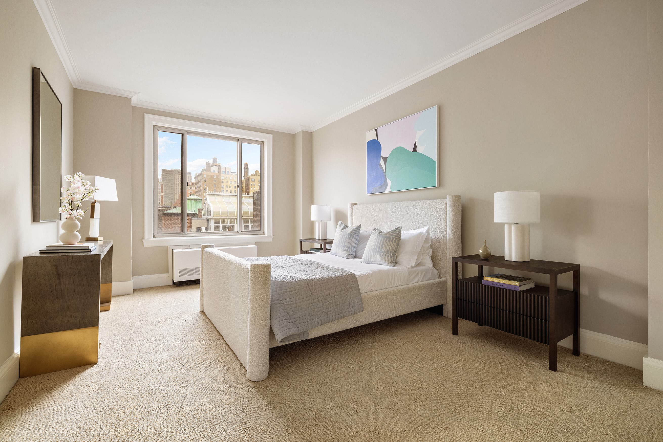1120 5th Avenue, Unit 7B Manhattan, NY 10128 - Photo 11 of 17 a bedroom with a bed and a couch