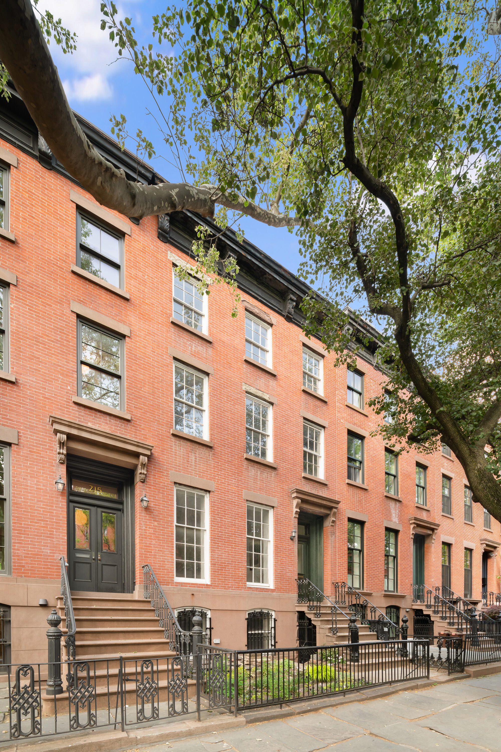 217 Dean Street Brooklyn, NY 11217 - Photo 24 of 26 a front view of a building with a pathway