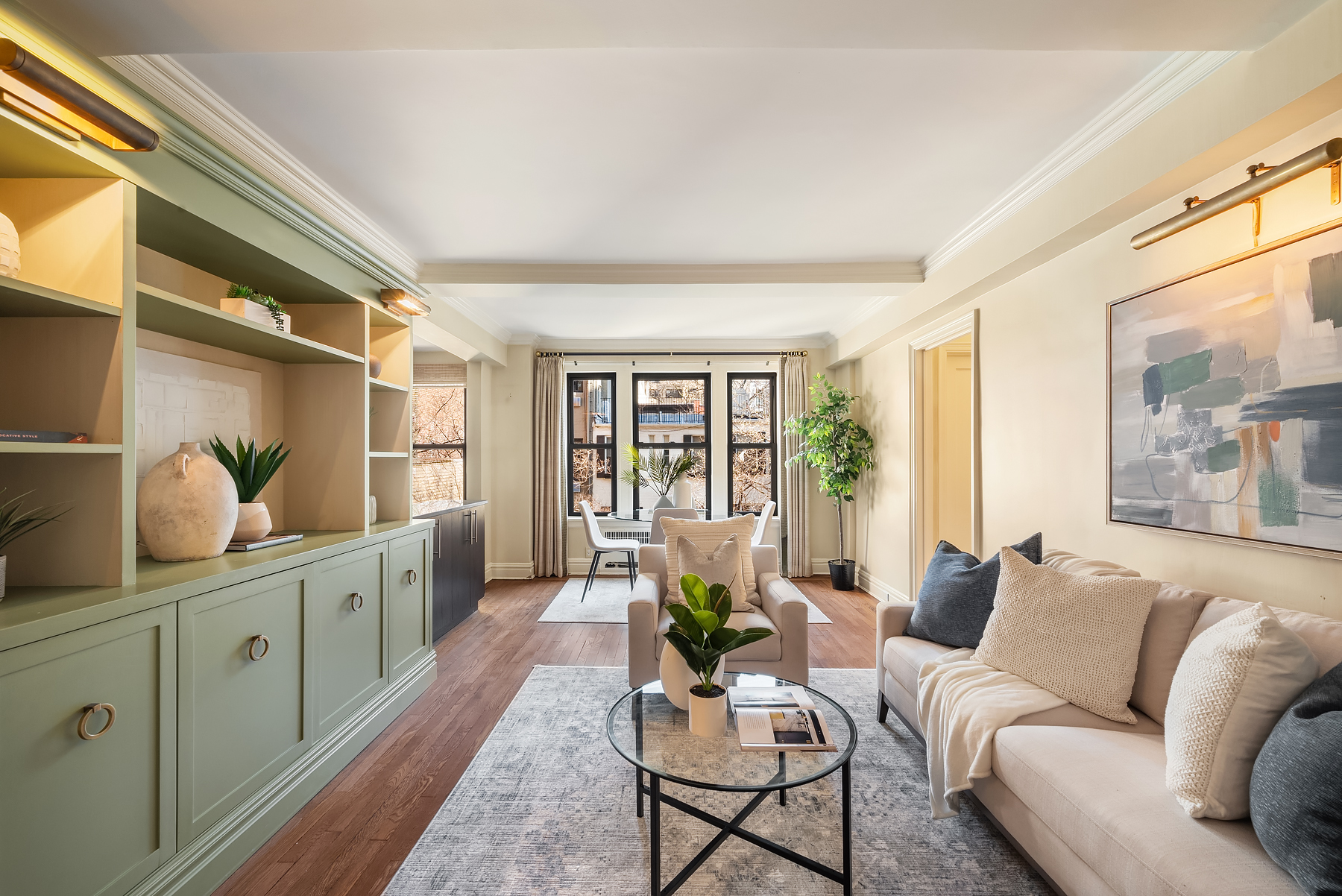 319 East 50th Street, Unit 4H Manhattan, NY 10022 - Photo 3 of 9 a living room with furniture and windows