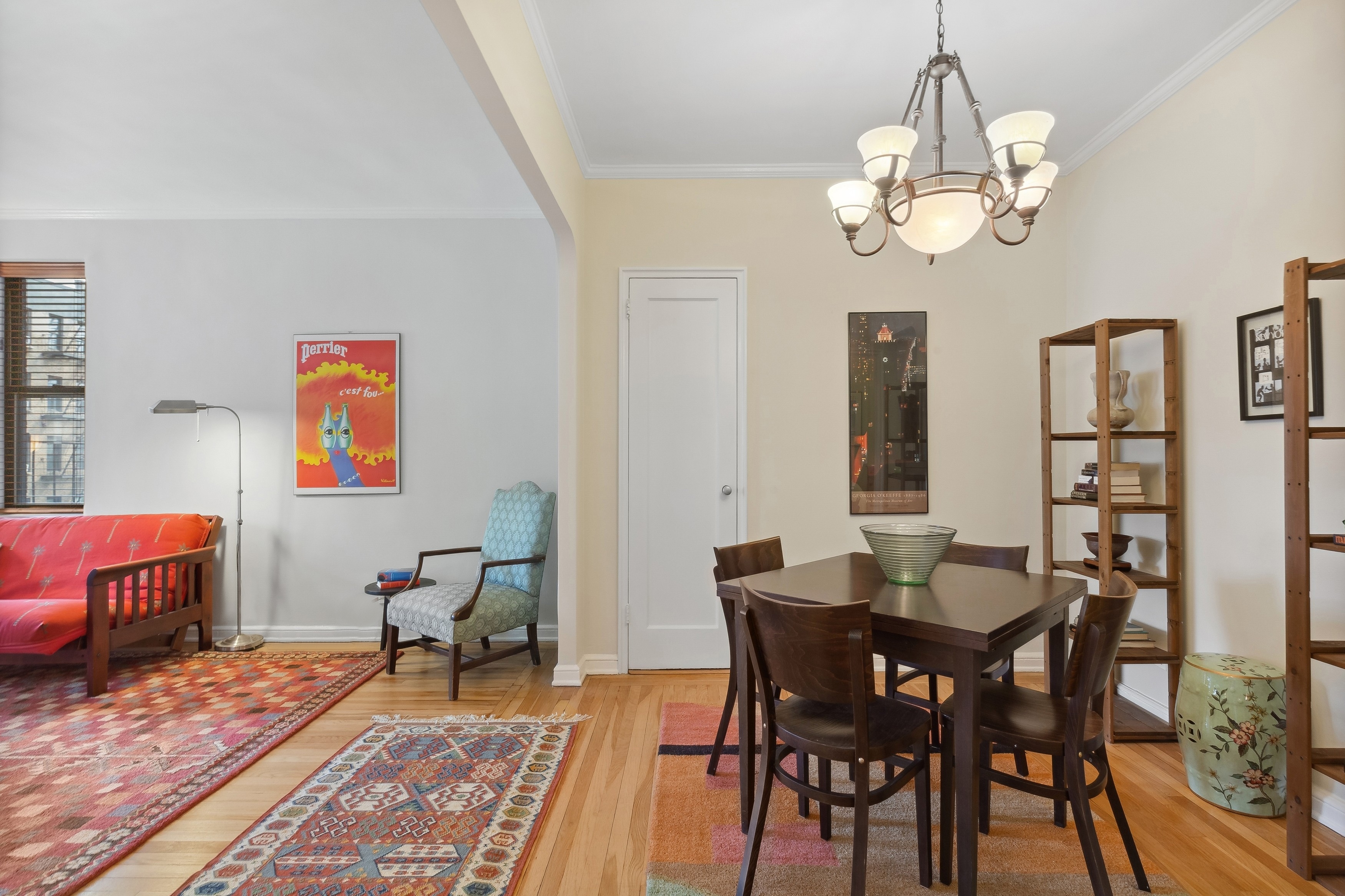 159-00 Riverside Drive West, Unit 5D Manhattan, NY 10032 - Photo 2 of 19 a view of a dining room with furniture wooden floor and chandelier
