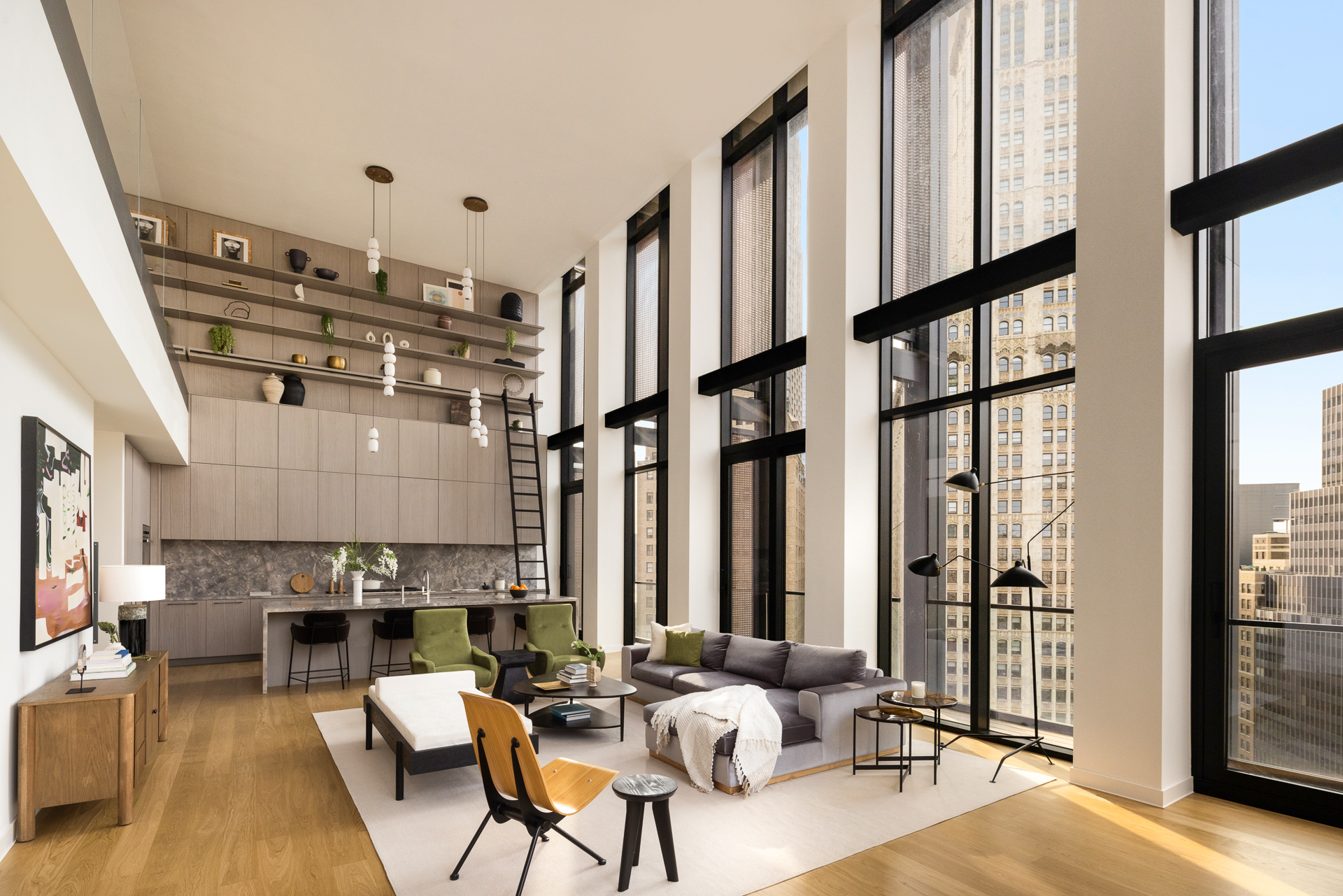 33 Park Row, Unit PH3 Manhattan, NY 10038 - Photo 6 of 30 a living room with furniture a fireplace and a large window