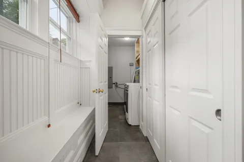 a bathroom with a tub and shower