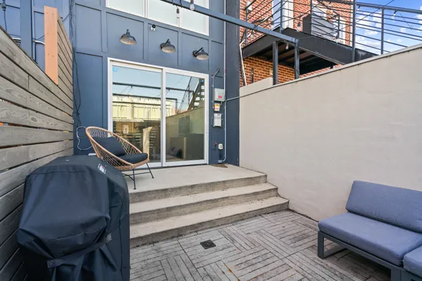 a view of outdoor space with seating area