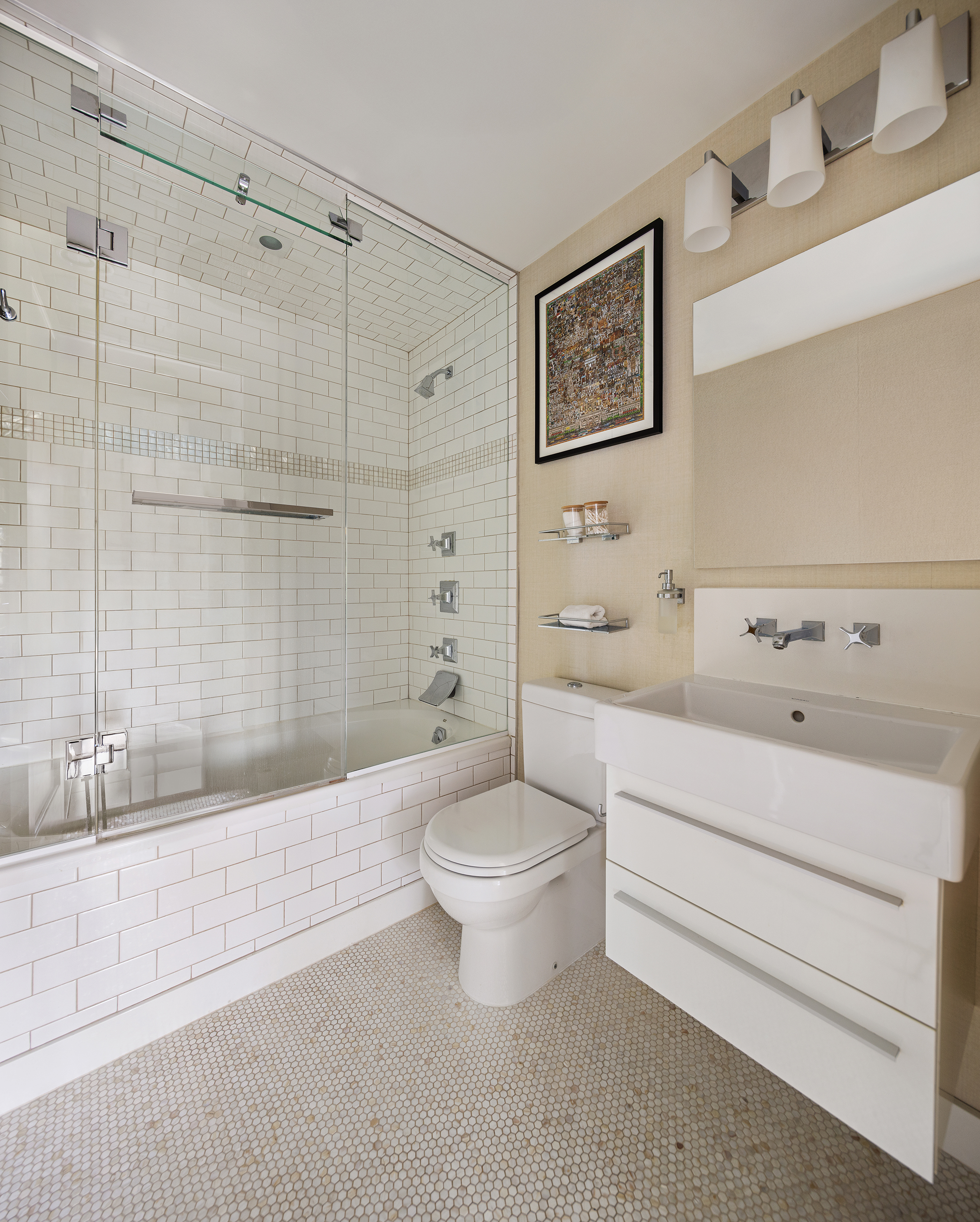 167 Perry Street, Unit 4NQ Manhattan, NY 10014 - Photo 15 of 20 a bathroom with a sink a toilet and shower
