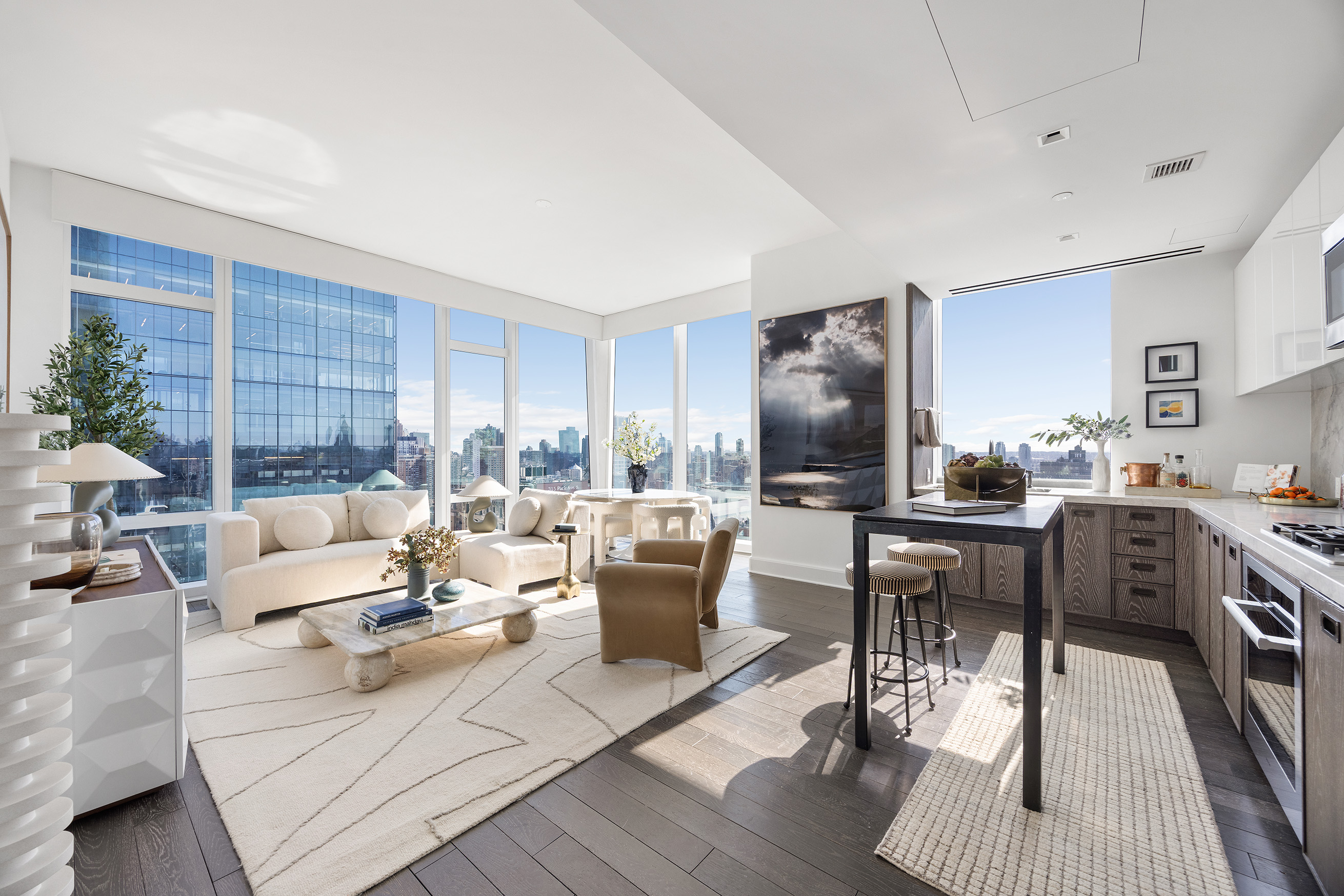 45 East 22nd Street, Unit 32B Manhattan, NY 10010 - Photo 1 of 36 a living room with furniture and a wooden floor