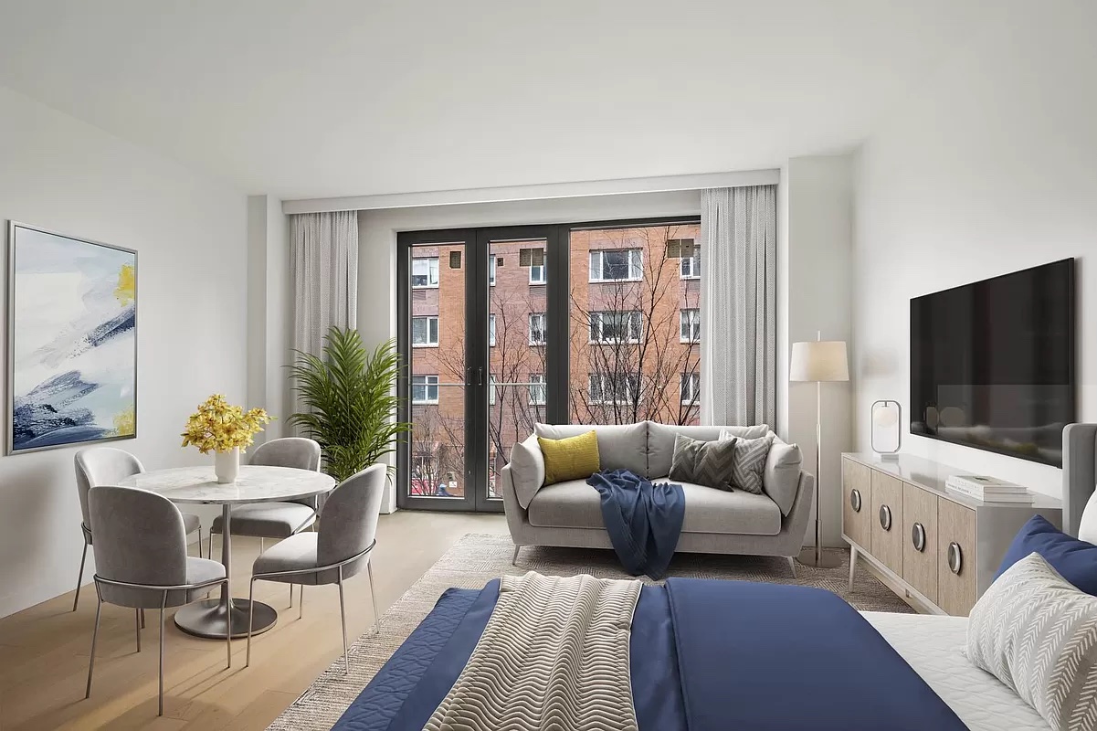 181 East 101st Street, Unit 507 Manhattan, NY 10029 - Photo 1 of 10 a living room with furniture and a flat screen tv