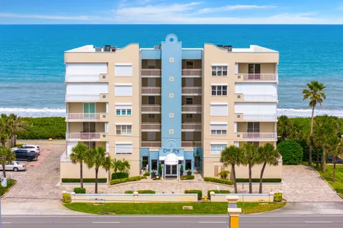 a view of building with yard