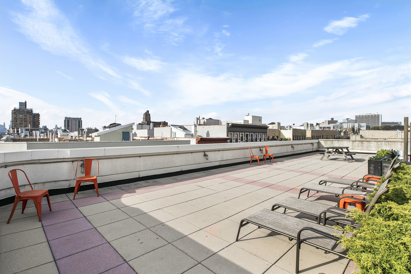 555 Lenox Avenue, Unit 3F Manhattan, NY 10030 - Photo 6 of 10 a terrace with outdoor seating and city view