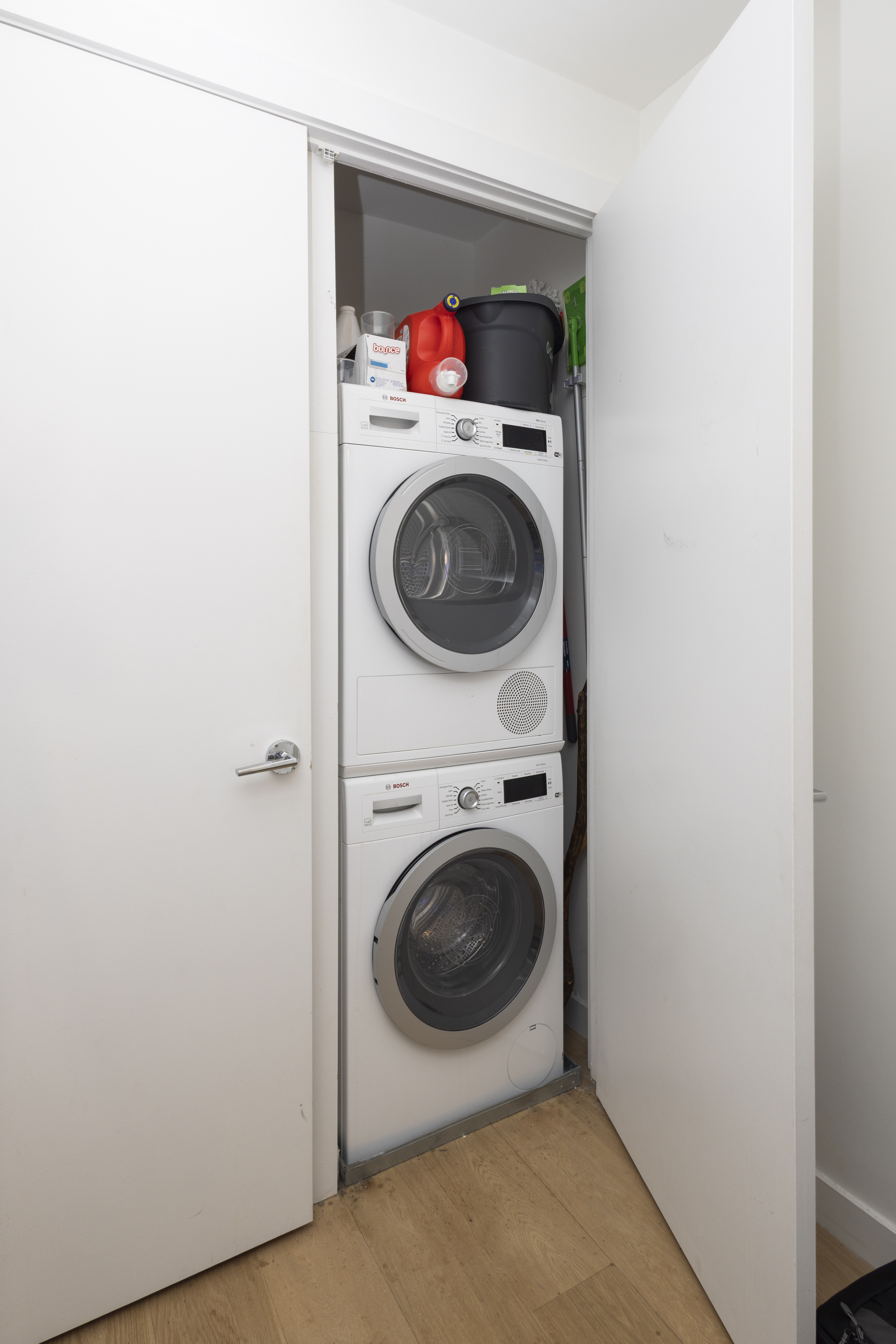 1330 5th Avenue, Unit 6C Manhattan, NY 10026 - Photo 11 of 16 a utility room with dryer and washer