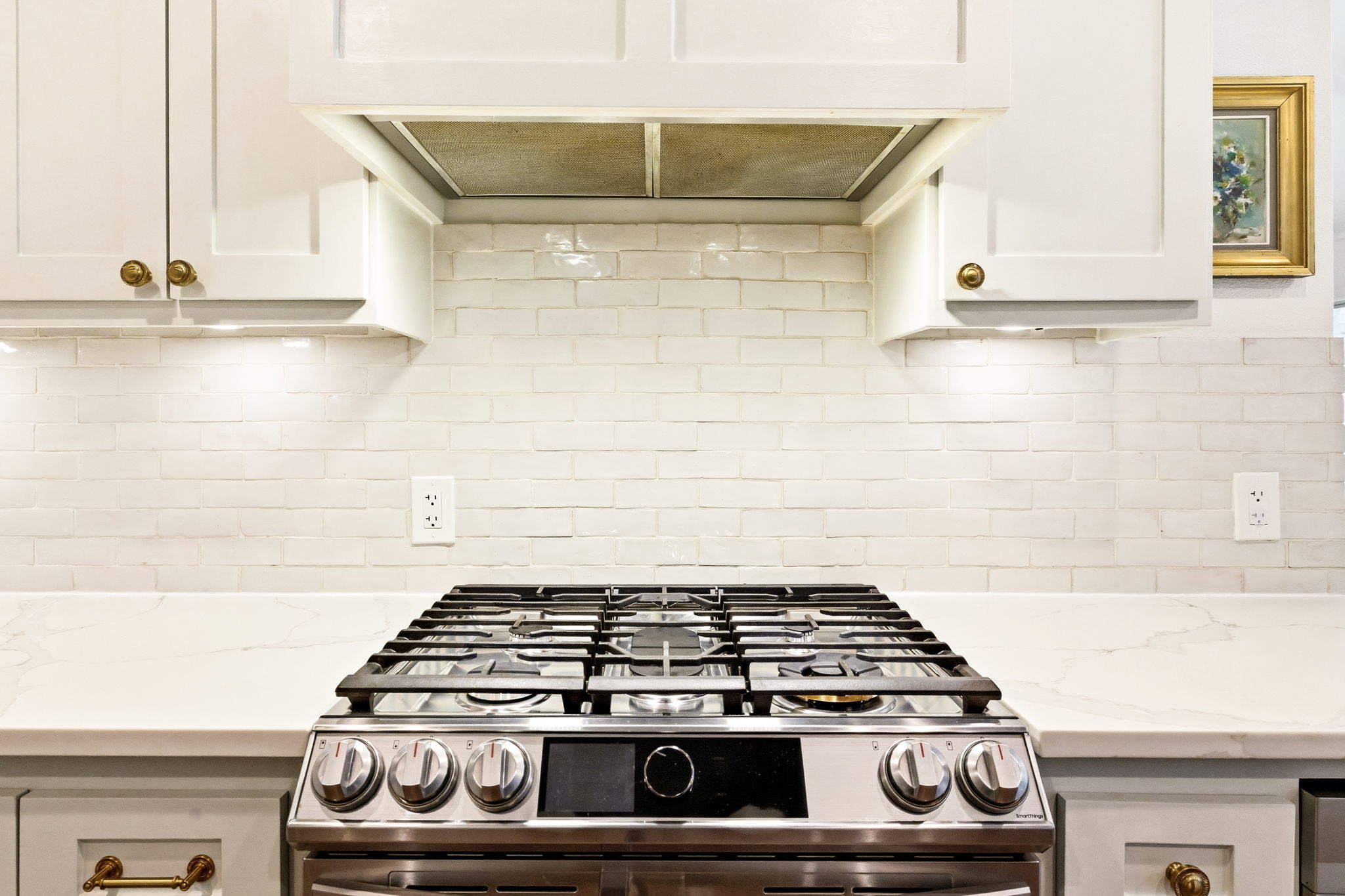 5765 Stonegate Road Dallas, TX 75209 - Photo 16 of 37 a stove top oven sitting inside of a kitchen
