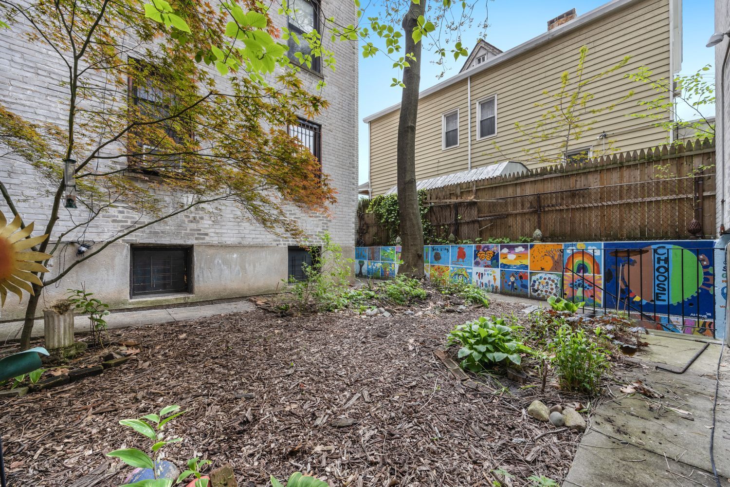 30 Ocean Parkway, Unit 5H Brooklyn, NY 11218 - Photo 15 of 17 a front view of a house with garden