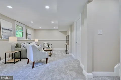 a workspace with furniture and window