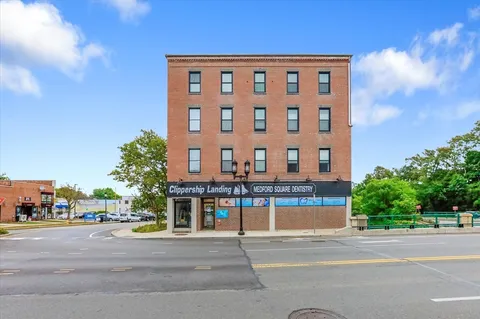 front view of a building with a street